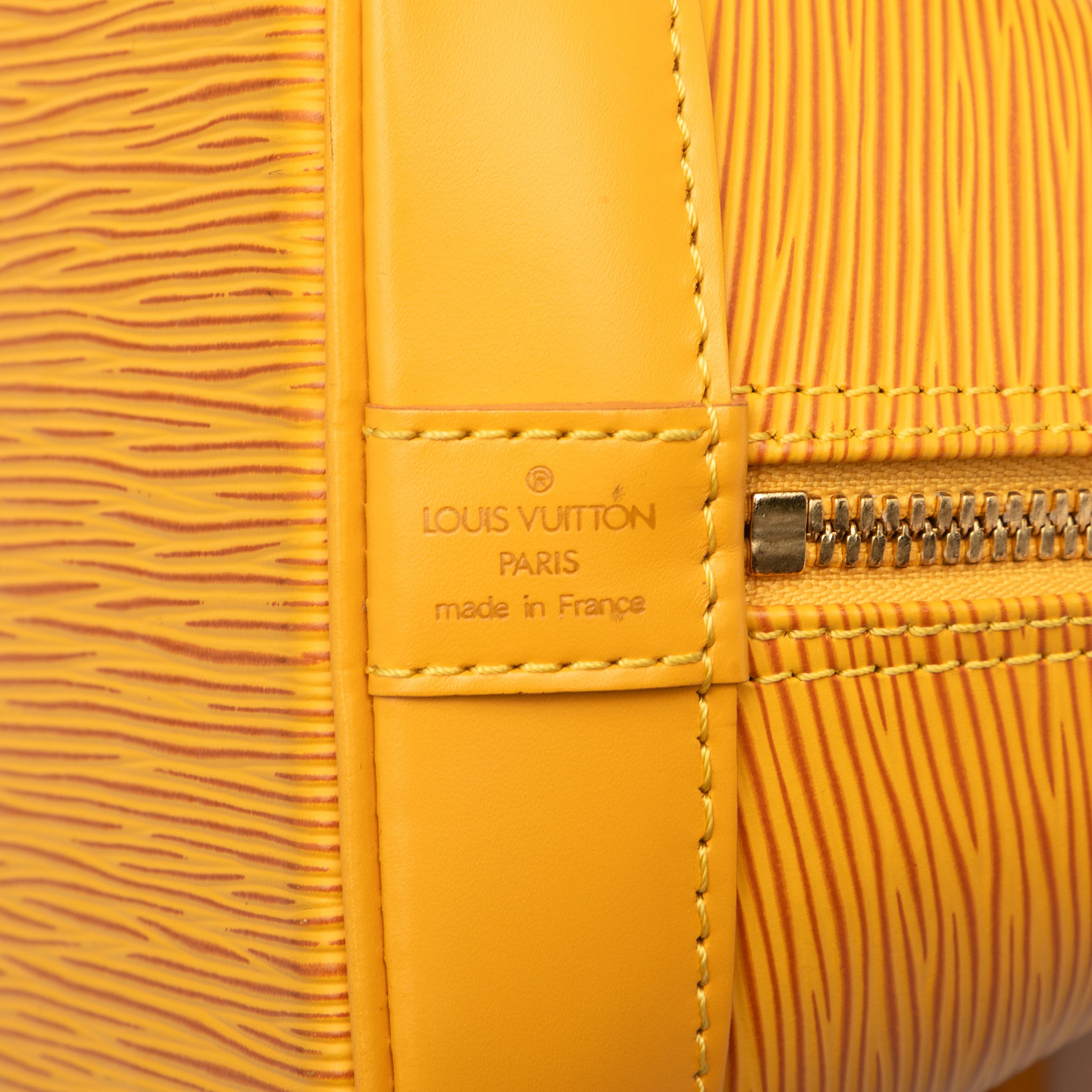 Louis Vuitton Epi Alma Pm, från Luxclusif, i färgen yellow. Klicka för att öppna bilden i stort format