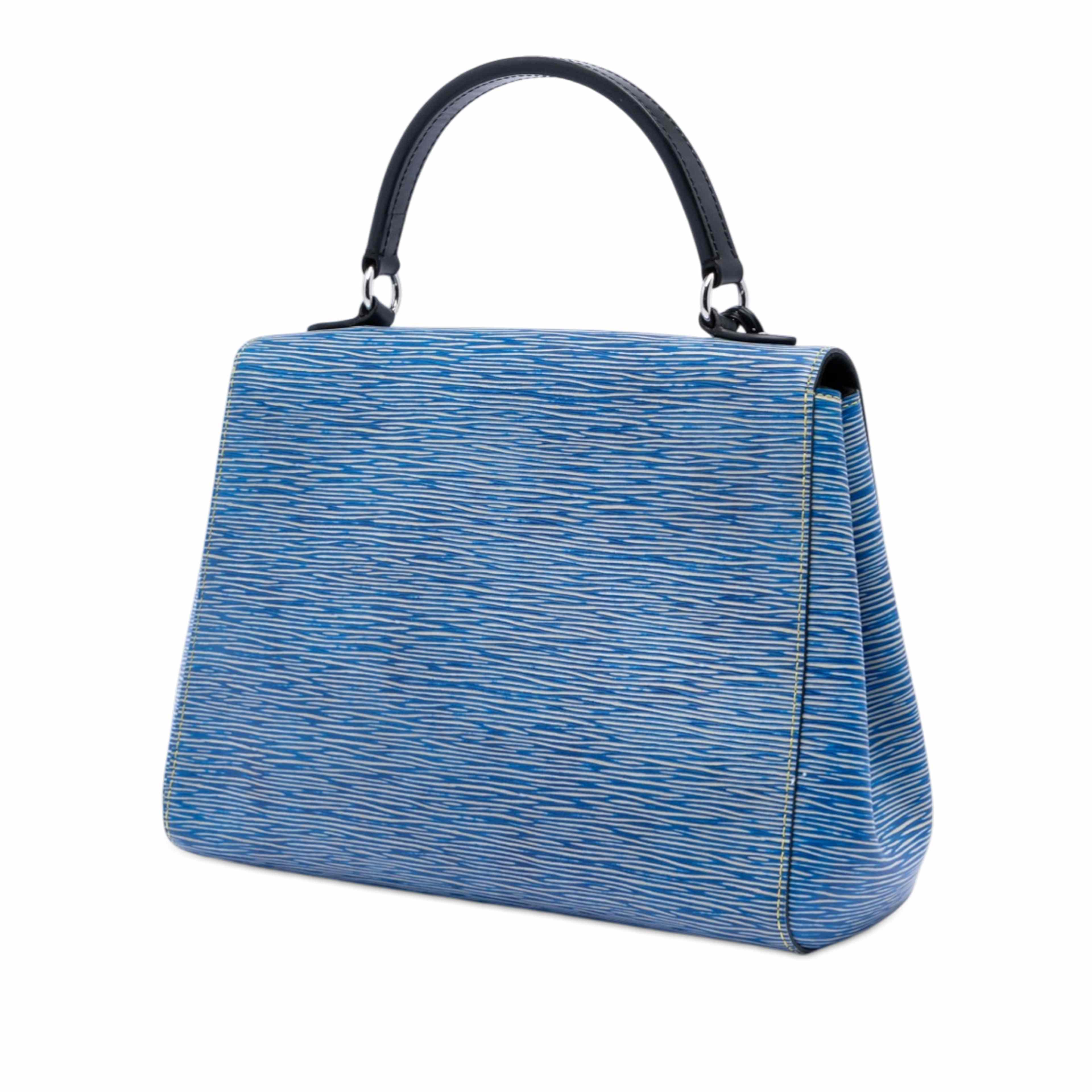 Louis Vuitton Epi Denim Cluny Mm, från Luxclusif, i färgen blå. Klicka för att öppna bilden i stort format