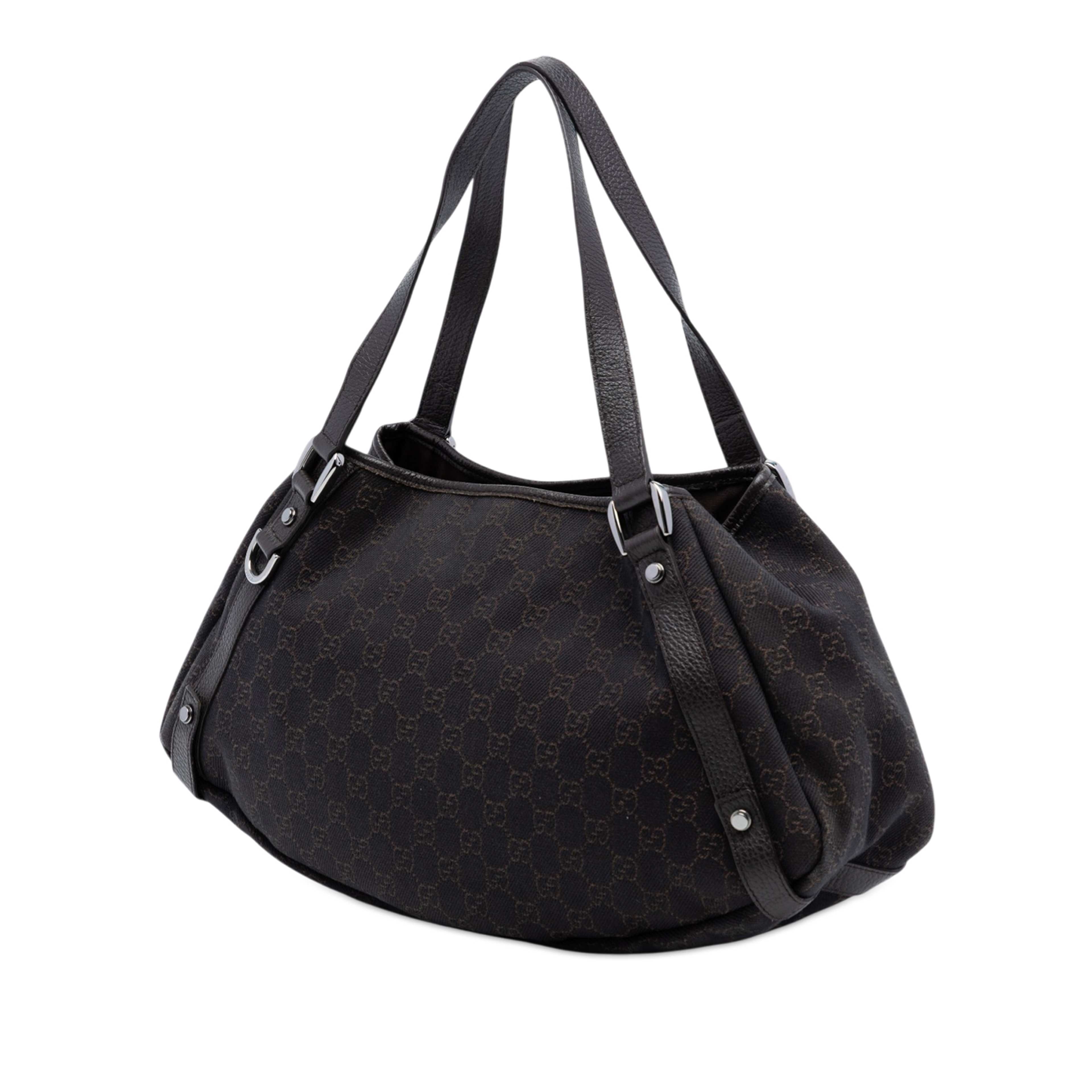 Gucci Gg Denim Abbey D Ring Tote, från Luxclusif, i färgen dark brown. Klicka för att öppna bilden i stort format