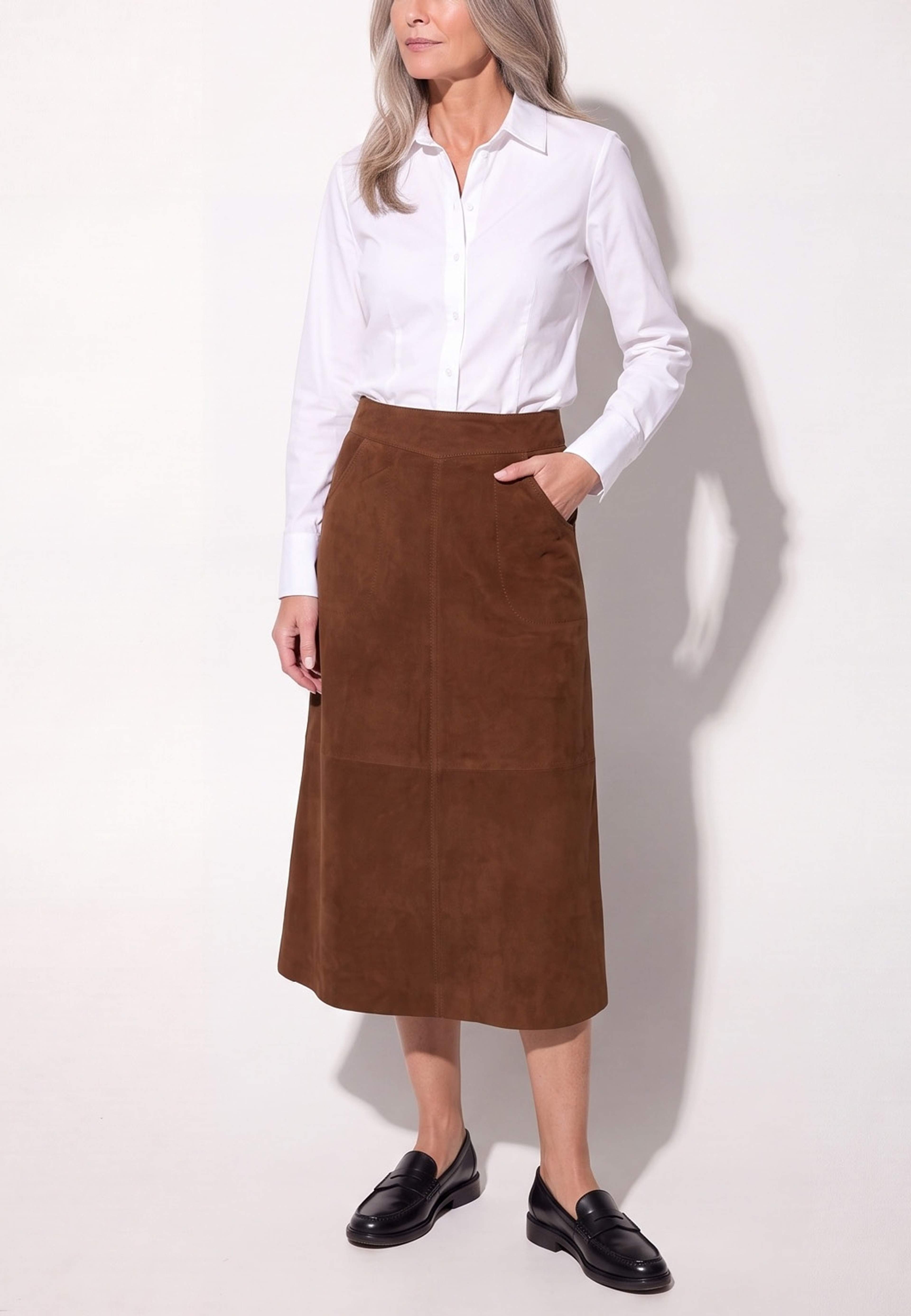 Dagmar Skirt, från Saki, i färgen walnut. Klicka för att öppna bilden i stort format