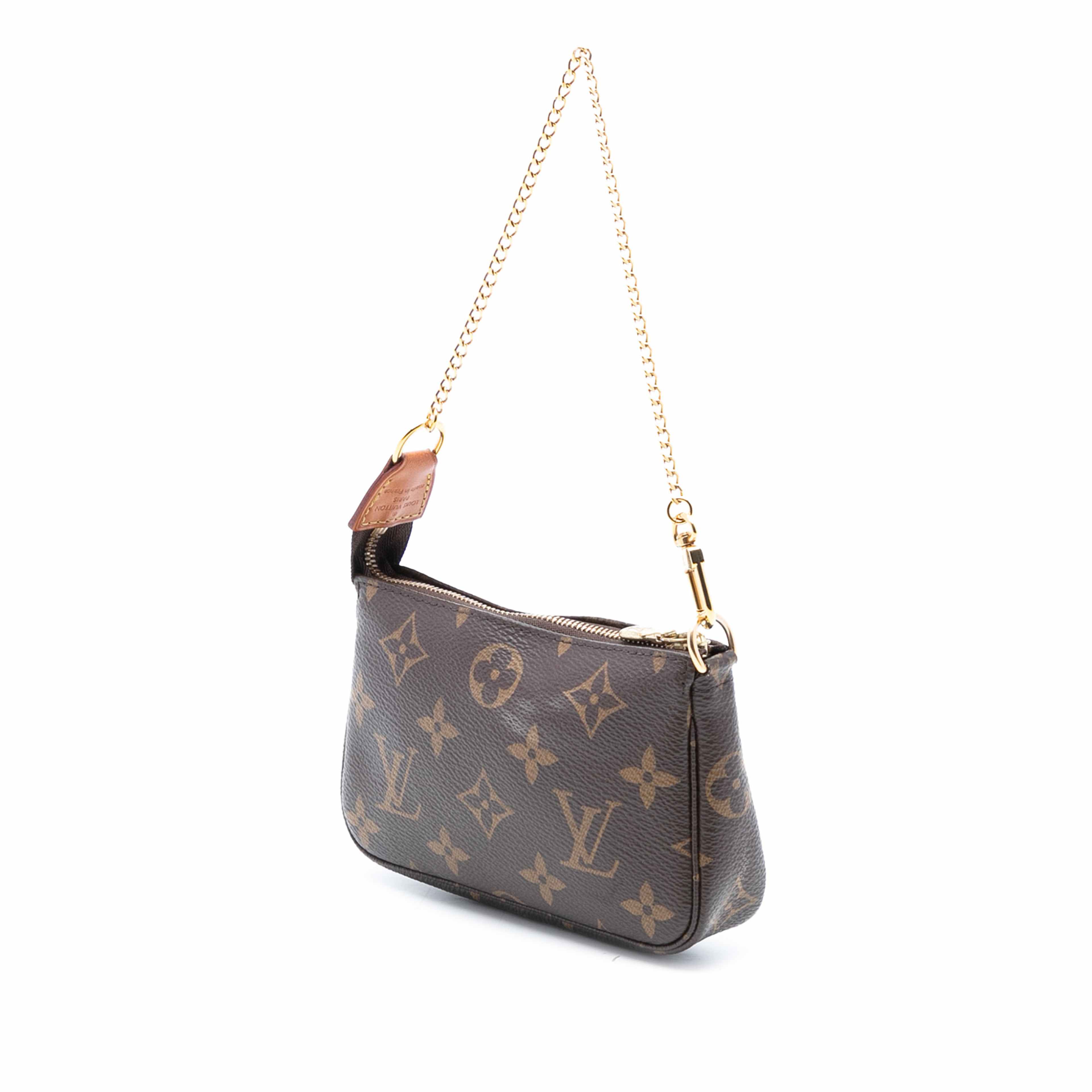 Louis Vuitton Monogram Mini Pochette Accessoires, från Luxclusif, i färgen brown. Klicka för att öppna bilden i stort format