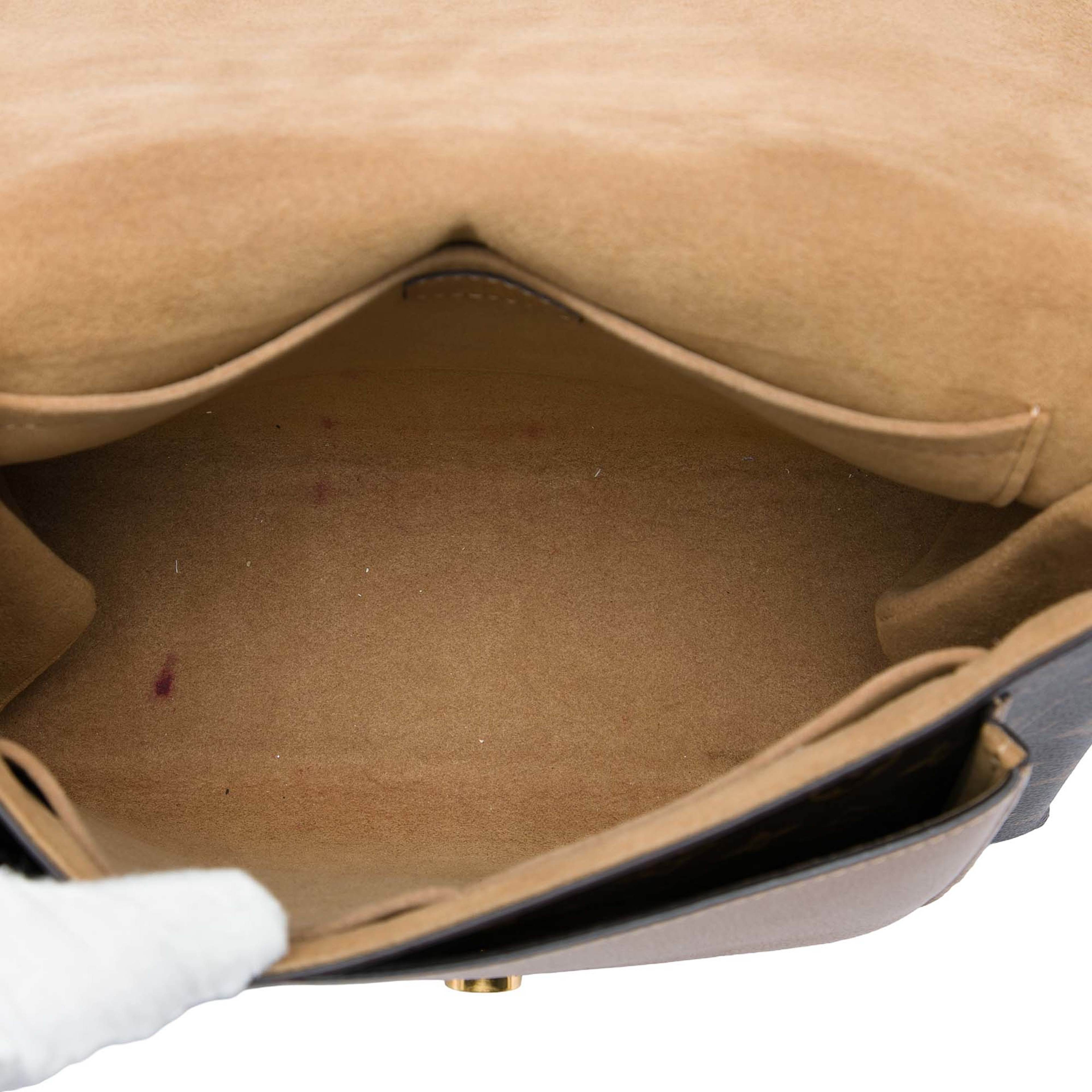 Louis Vuitton Monogram Marignan, från Luxclusif, i färgen brun. Klicka för att öppna bilden i stort format