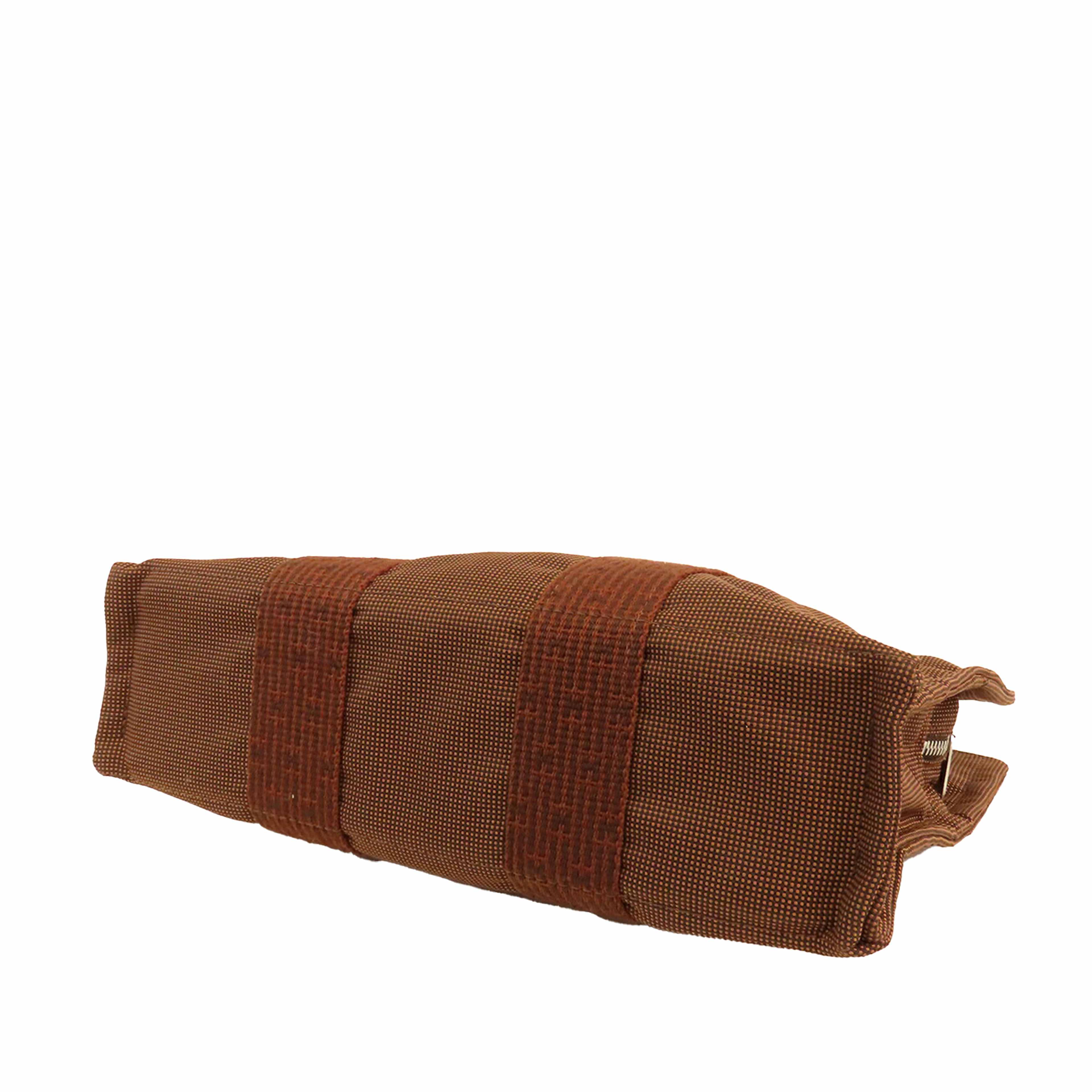 Hermès Canvas Herline Pm, från Luxclusif, i färgen brown. Klicka för att öppna bilden i stort format