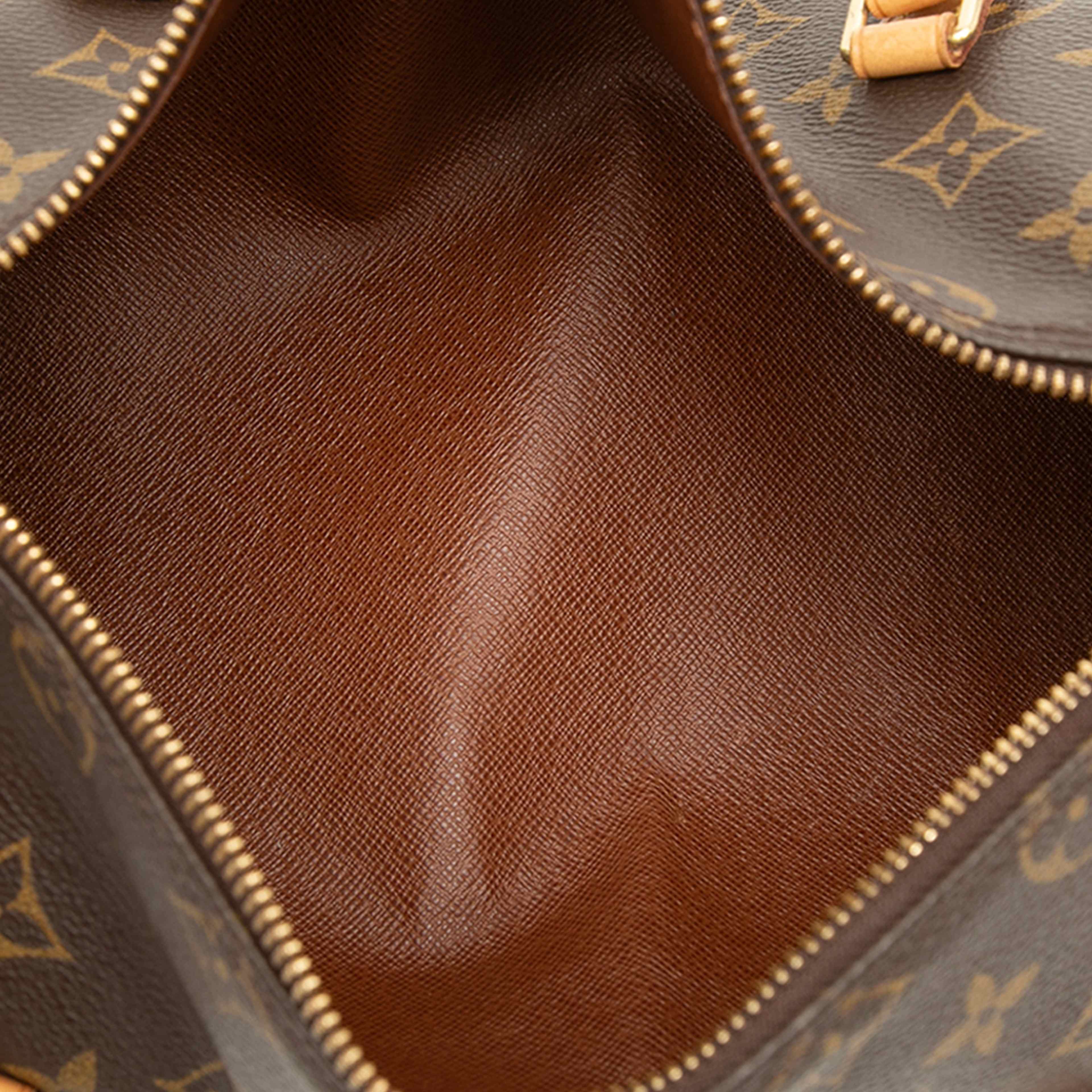 Louis Vuitton Monogram Papillon 28, från Luxclusif, i färgen brun. Klicka för att öppna bilden i stort format