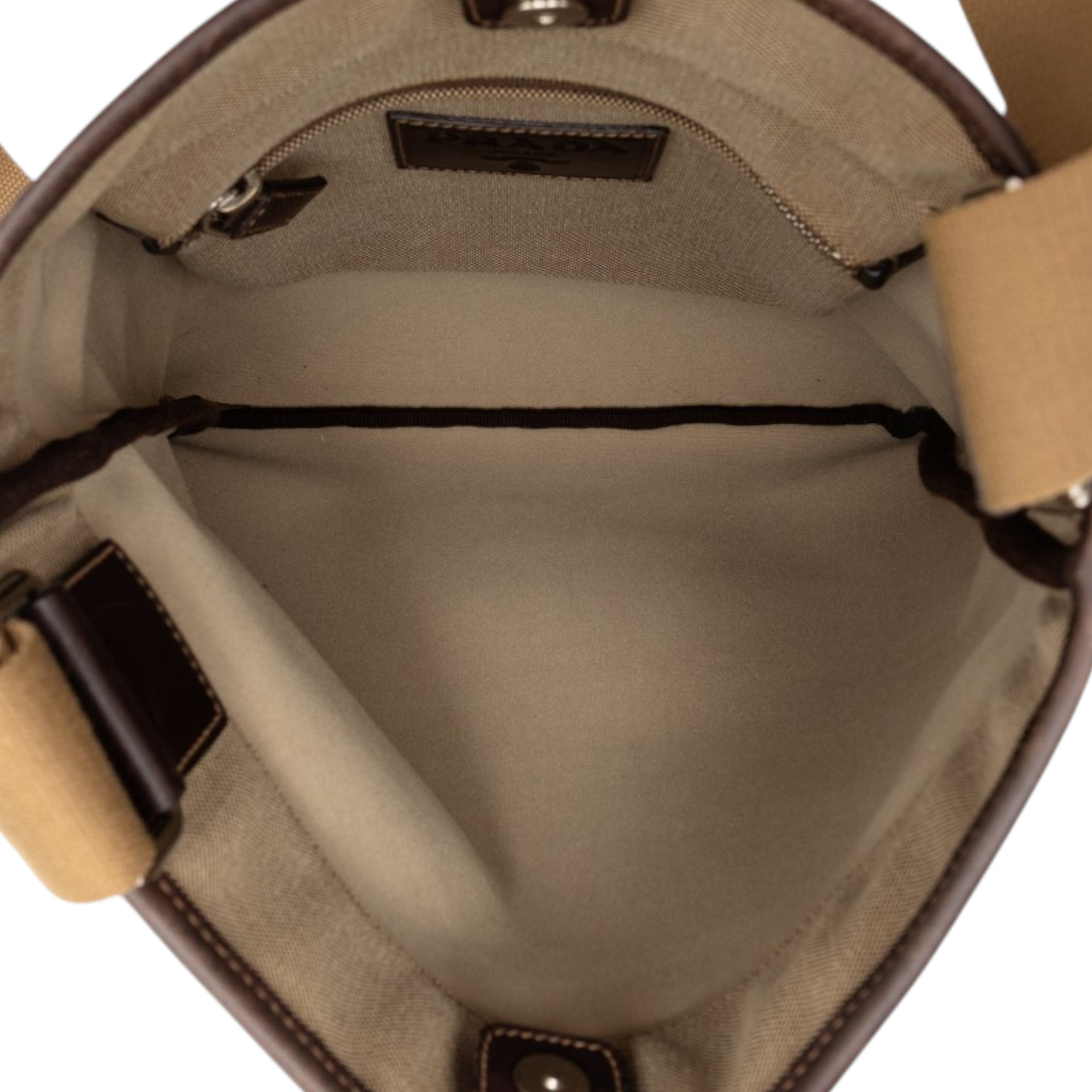 Prada Canvas Canapa Logo Crossbody, från Luxclusif, i färgen beige. Klicka för att öppna bilden i stort format