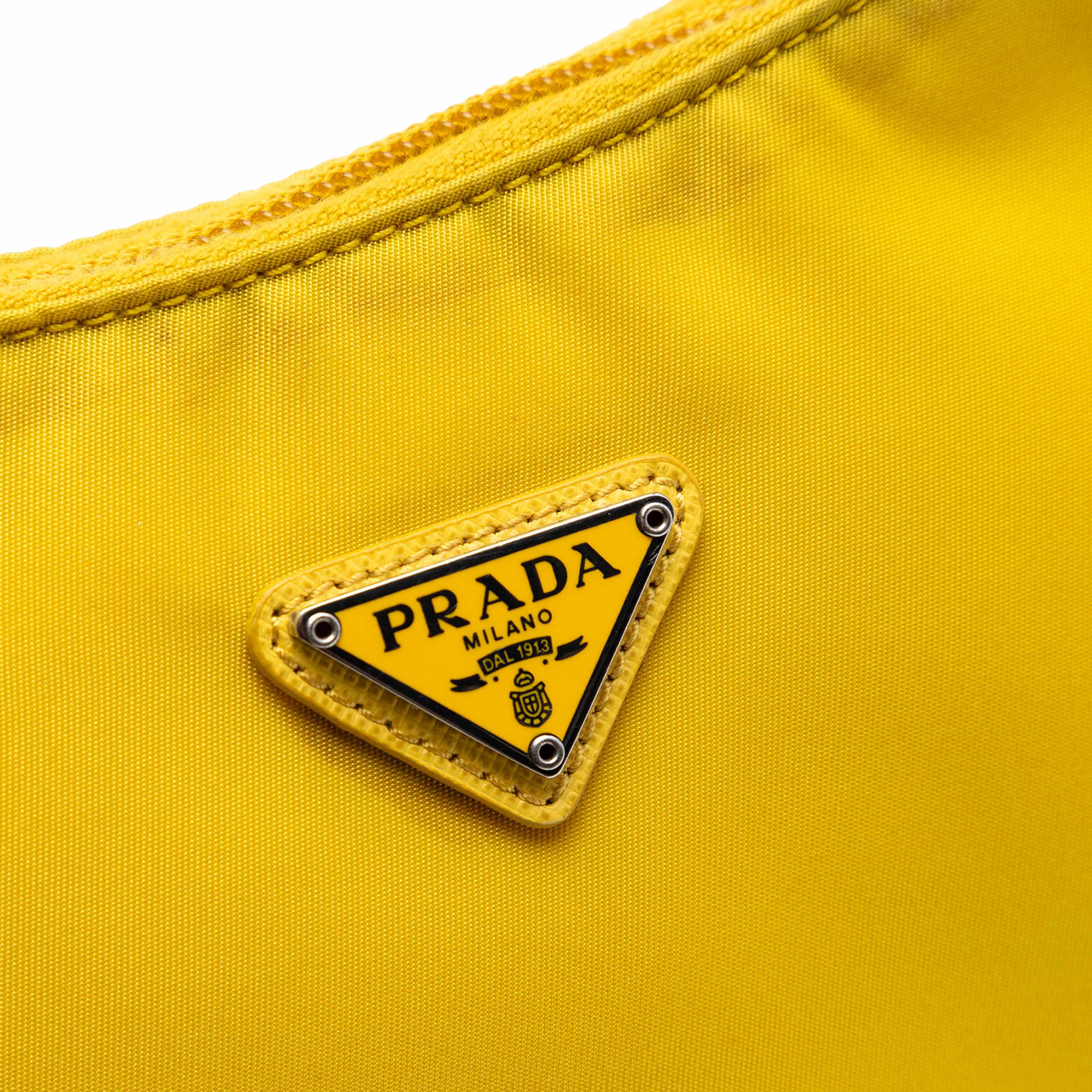 Prada Mini Tessuto Re Edition 2000 Shoulder Bag, från Luxclusif, i färgen gul. Klicka för att öppna bilden i stort format