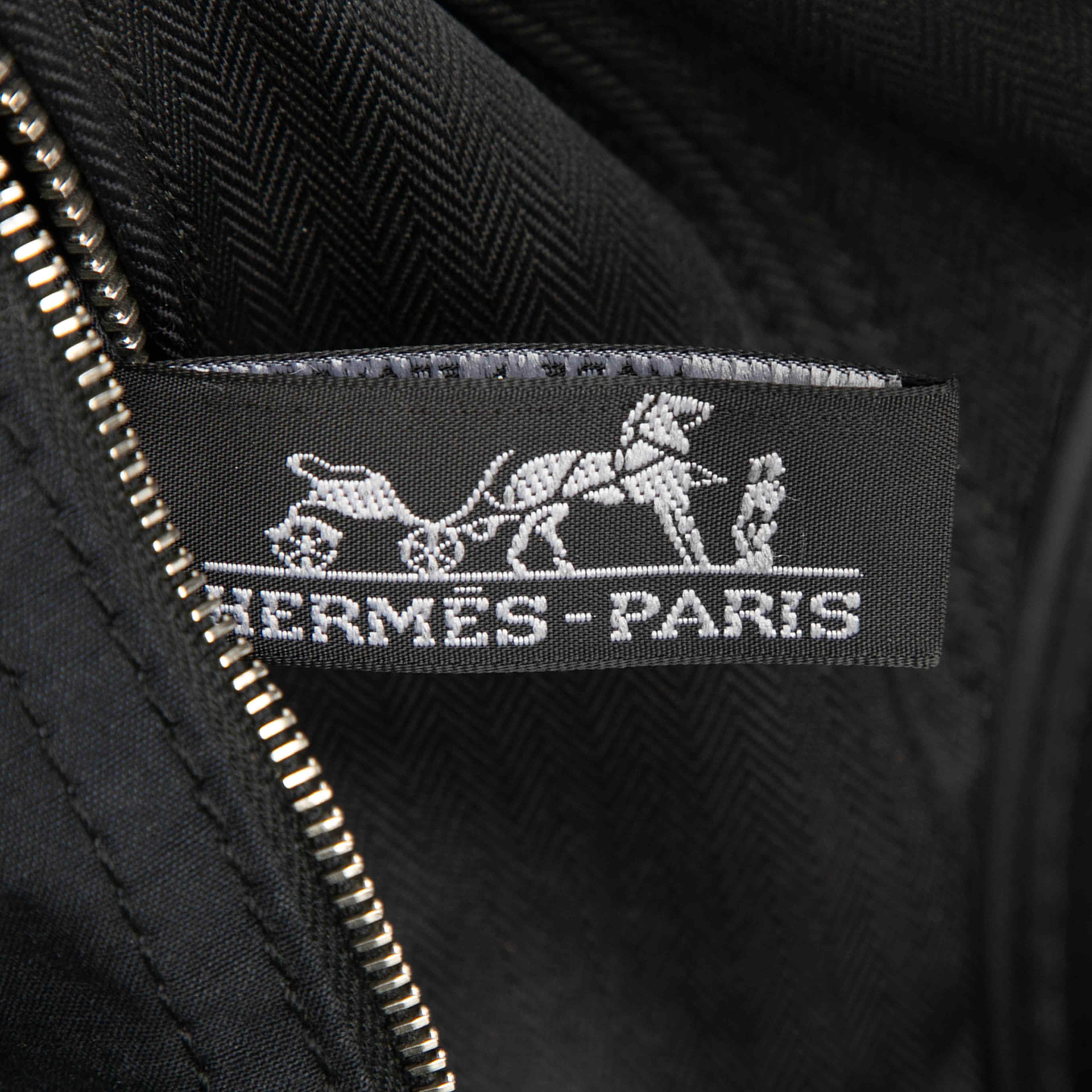 Hermès Toile Acapulco Pm, från Luxclusif, i färgen black. Klicka för att öppna bilden i stort format