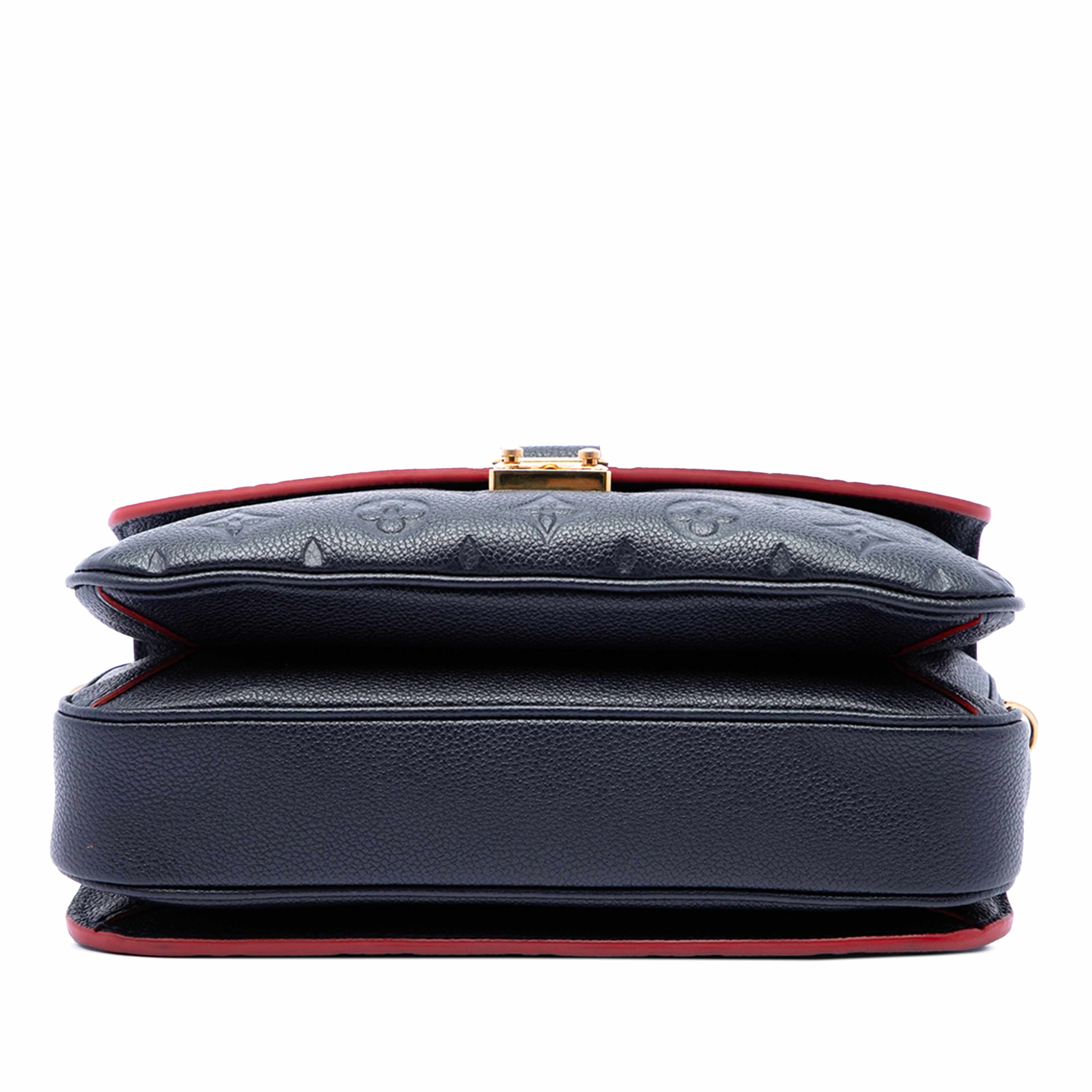 Louis Vuitton Monogram Empreinte Pochette Metis, från Luxclusif, i färgen blå. Klicka för att öppna bilden i stort format