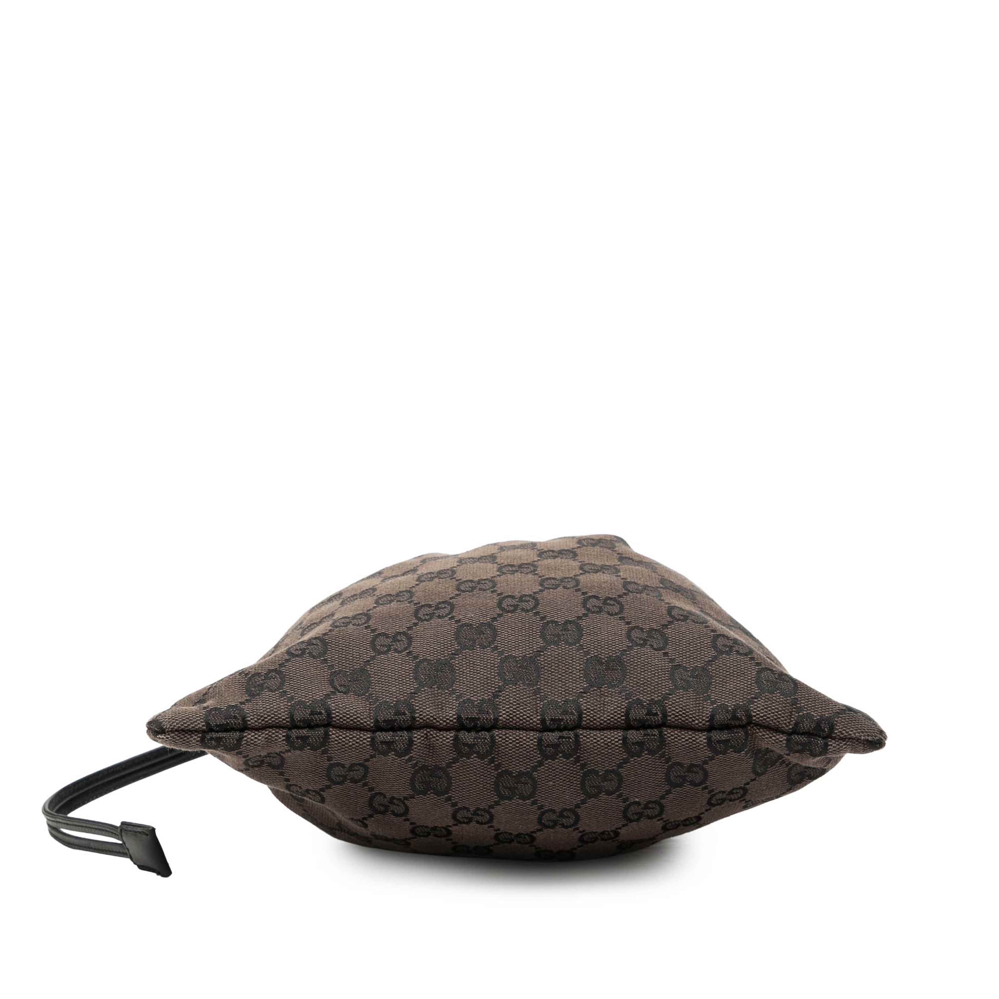 Gucci Gg Canvas Drawstring Pouch, från Luxclusif, i färgen dark brown. Klicka för att öppna bilden i stort format