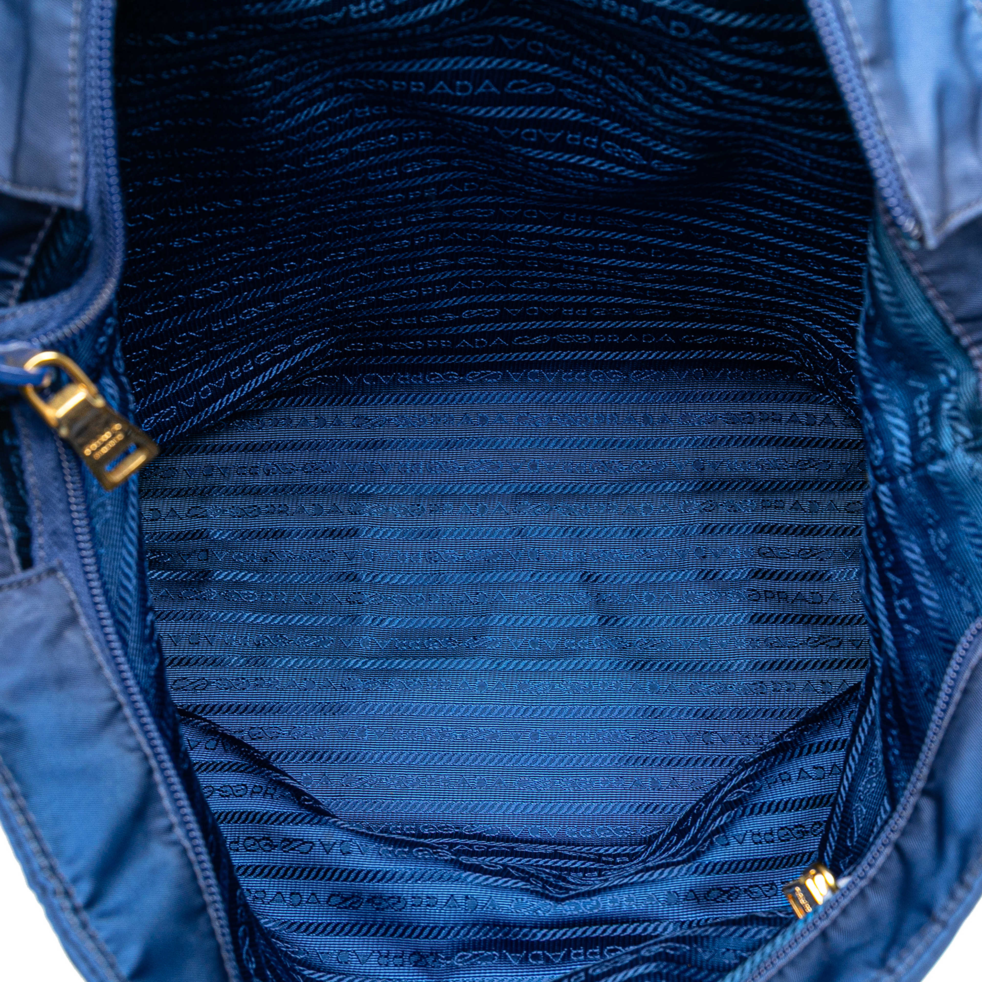 Prada Tessuto Satchel, från Luxclusif, i färgen blue. Klicka för att öppna bilden i stort format