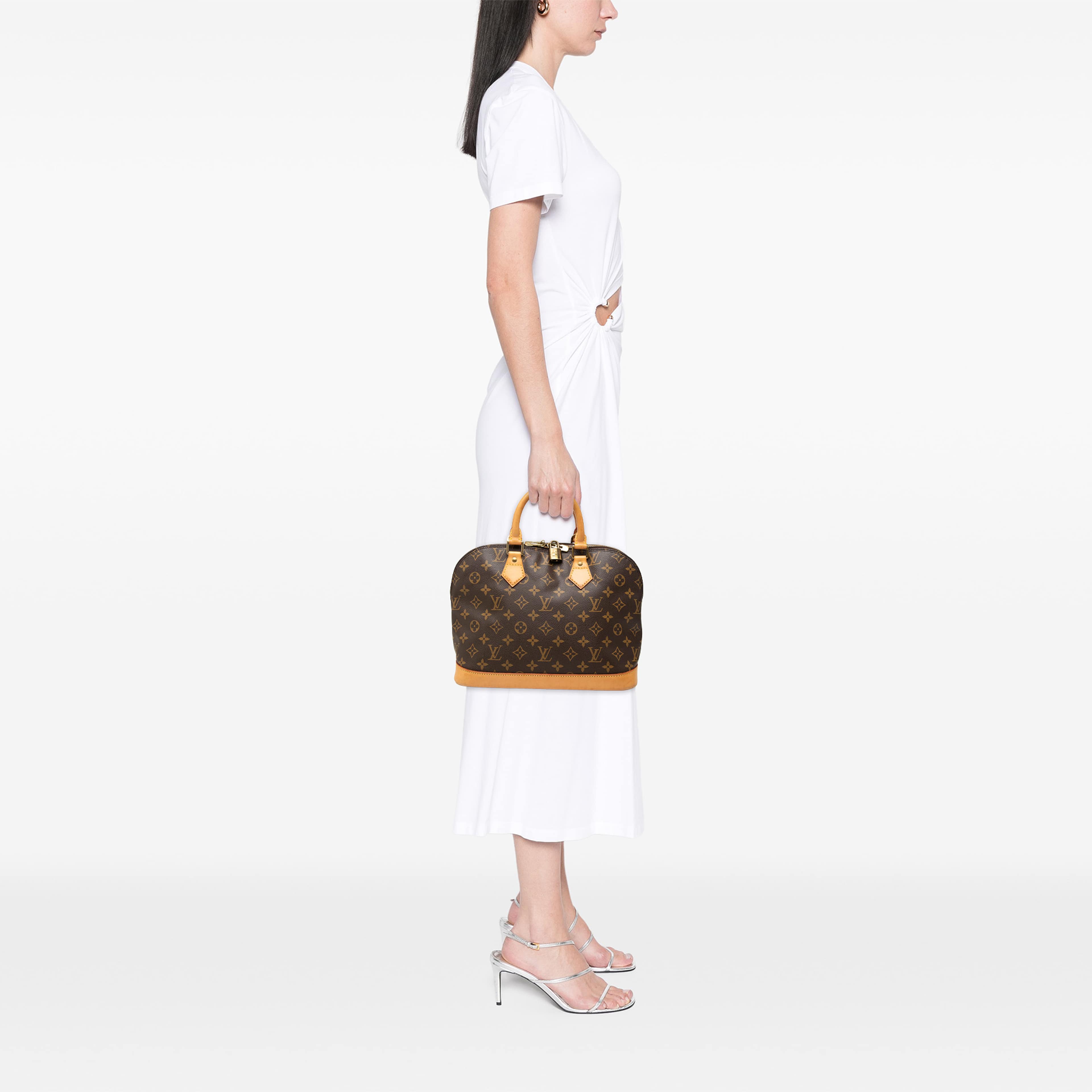 Louis Vuitton Monogram Alma Pm, från Luxclusif, i färgen brun. Klicka för att öppna bilden i stort format
