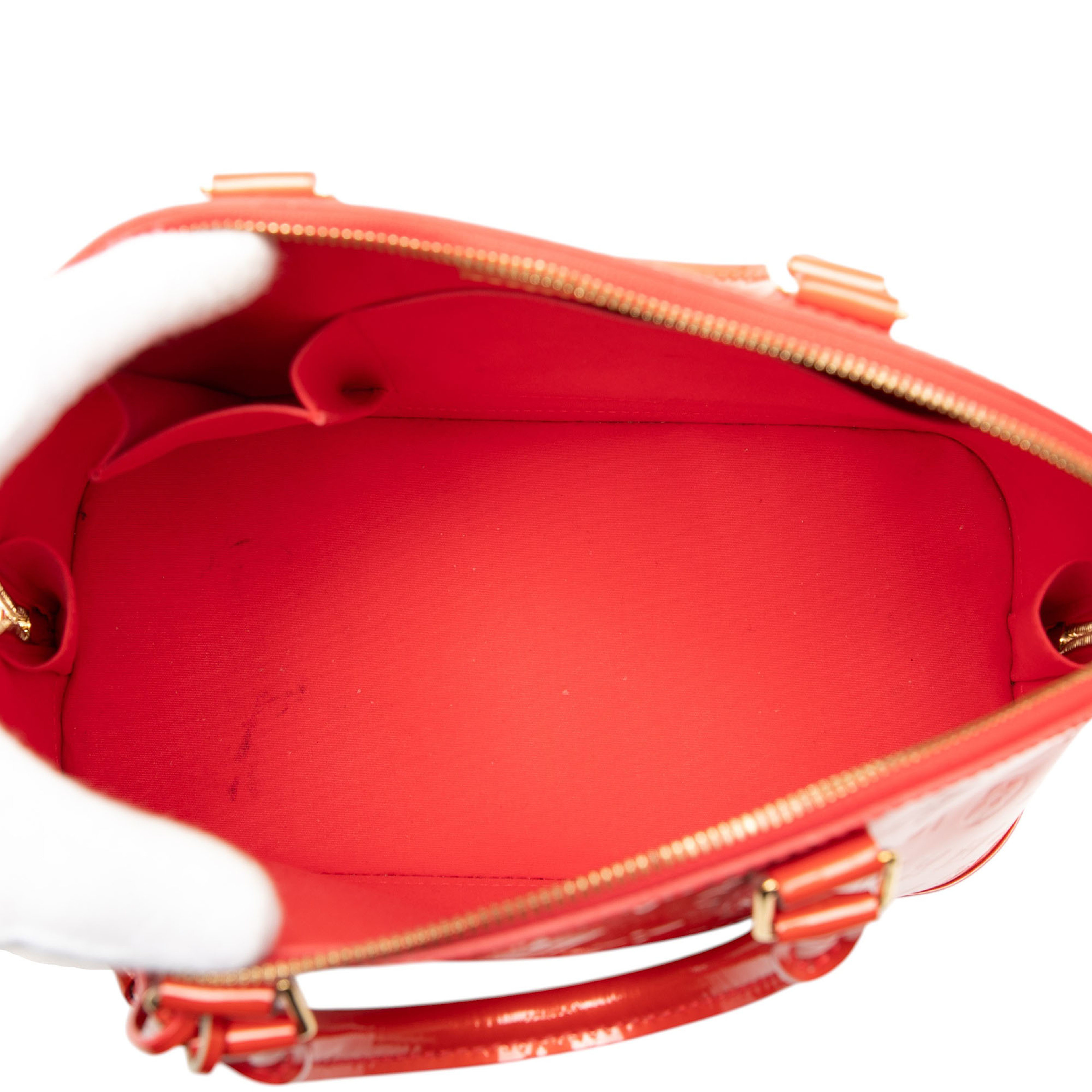 Louis Vuitton Monogram Vernis Alma Pm, från Luxclusif, i färgen orange. Klicka för att öppna bilden i stort format