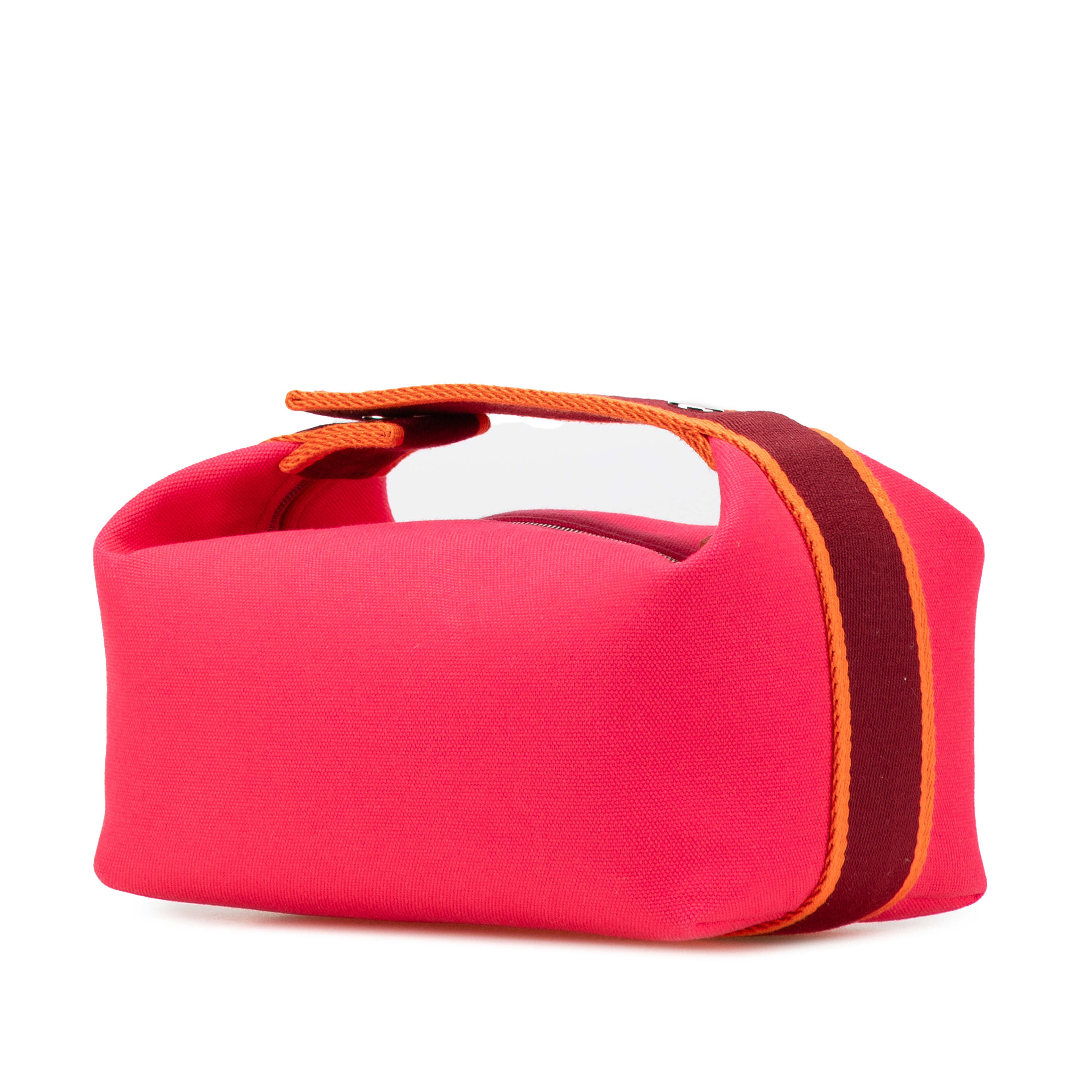 Hermès Small Toile Bride A Brac Case, från Luxclusif, i färgen rosa. Klicka för att öppna bilden i stort format