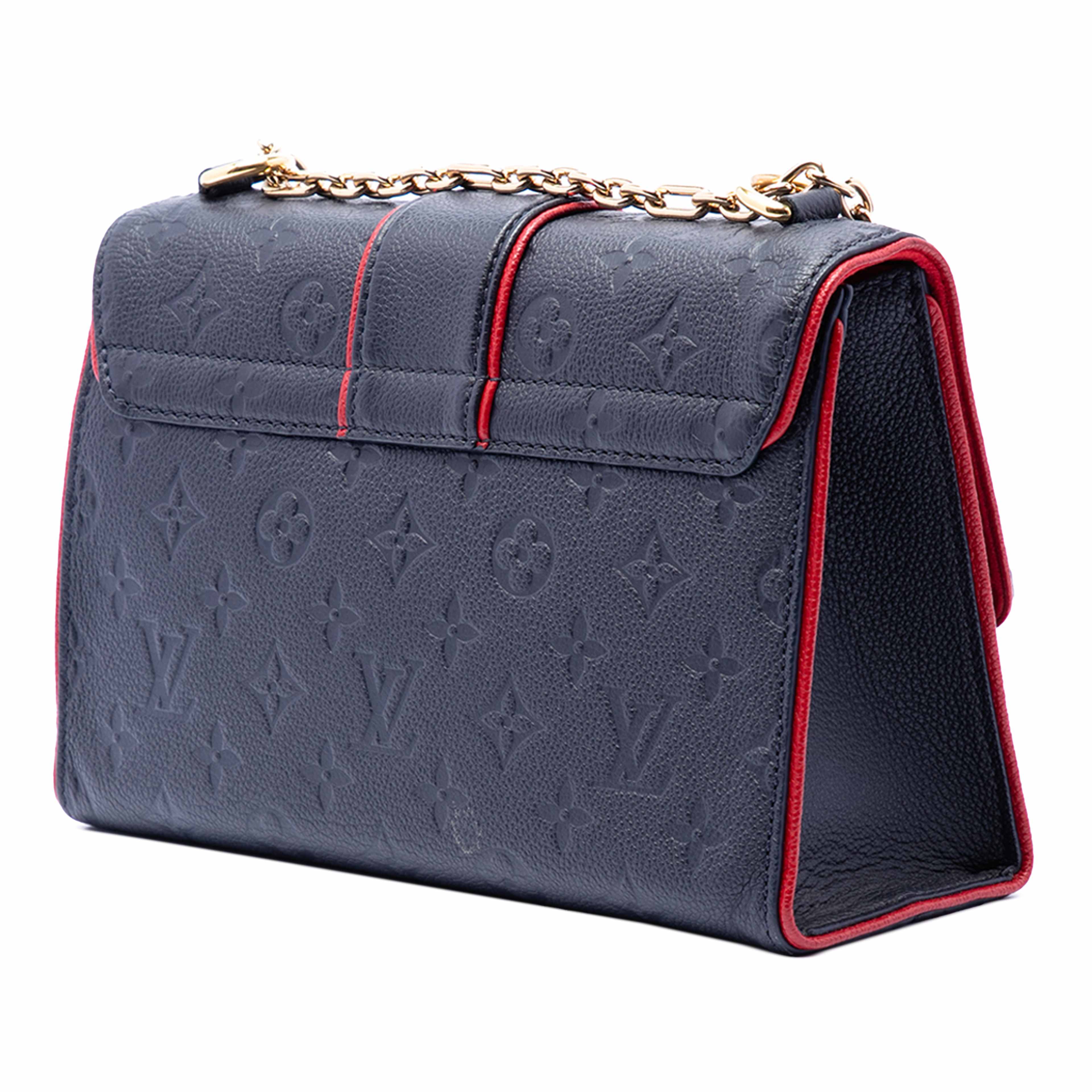 Louis Vuitton Monogram Empreinte Saint Sulpice Pm, från Luxclusif, i färgen navy. Klicka för att öppna bilden i stort format