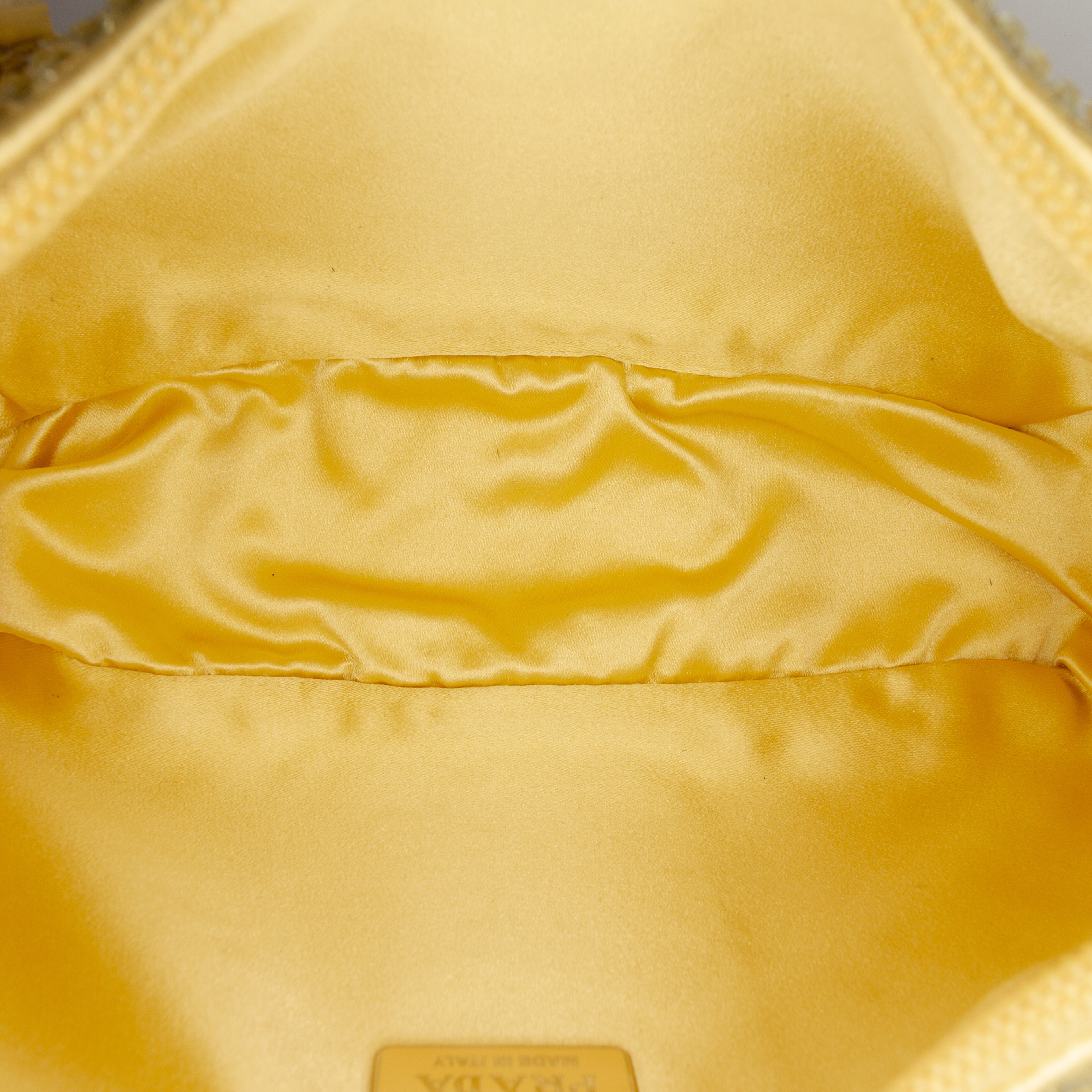 Prada Mini Satin Crystal Re Edition 2000 Shoulder Bag, från Luxclusif, i färgen yellow. Klicka för att öppna bilden i stort format