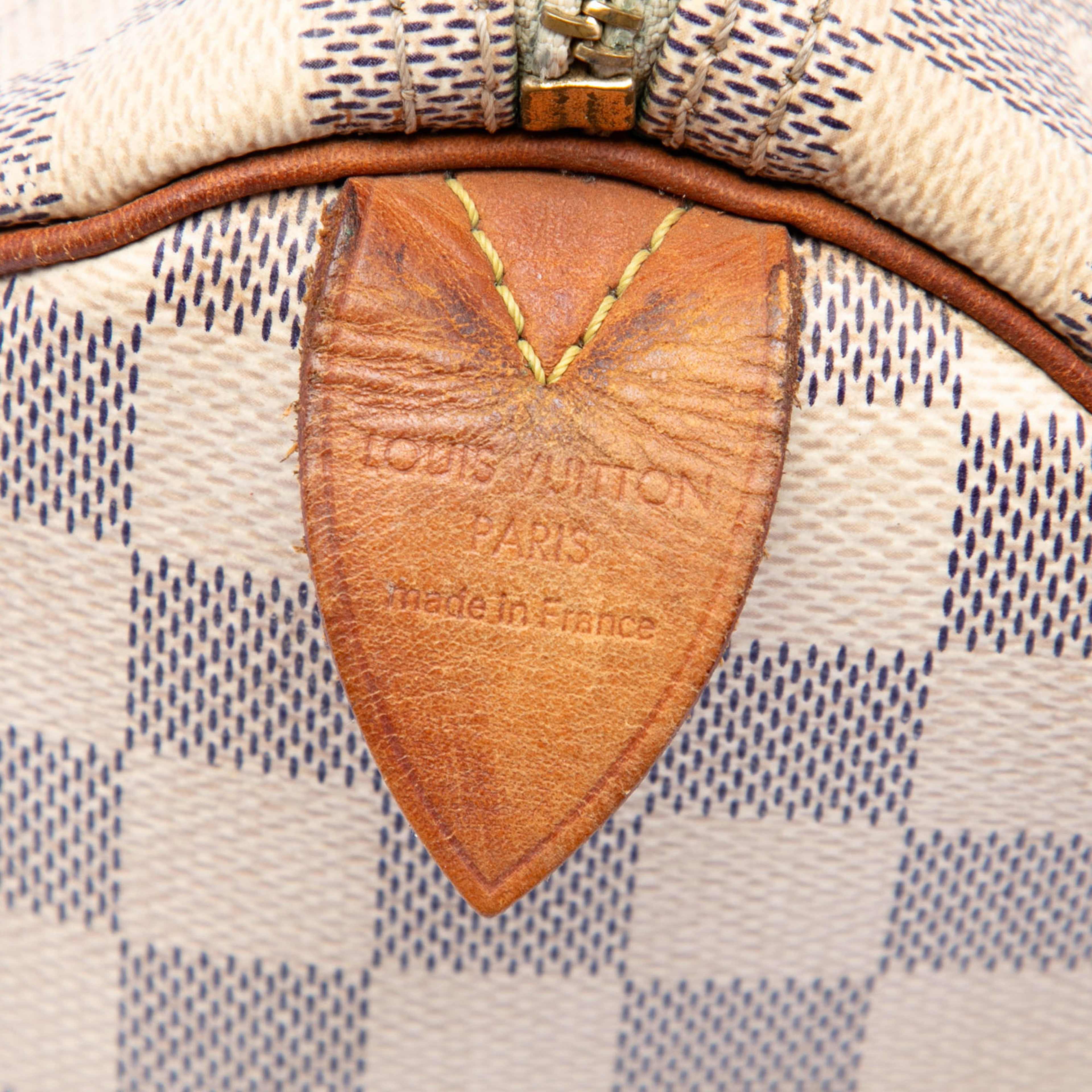 Louis Vuitton Damier Azur Speedy 30, från Luxclusif, i färgen white. Klicka för att öppna bilden i stort format