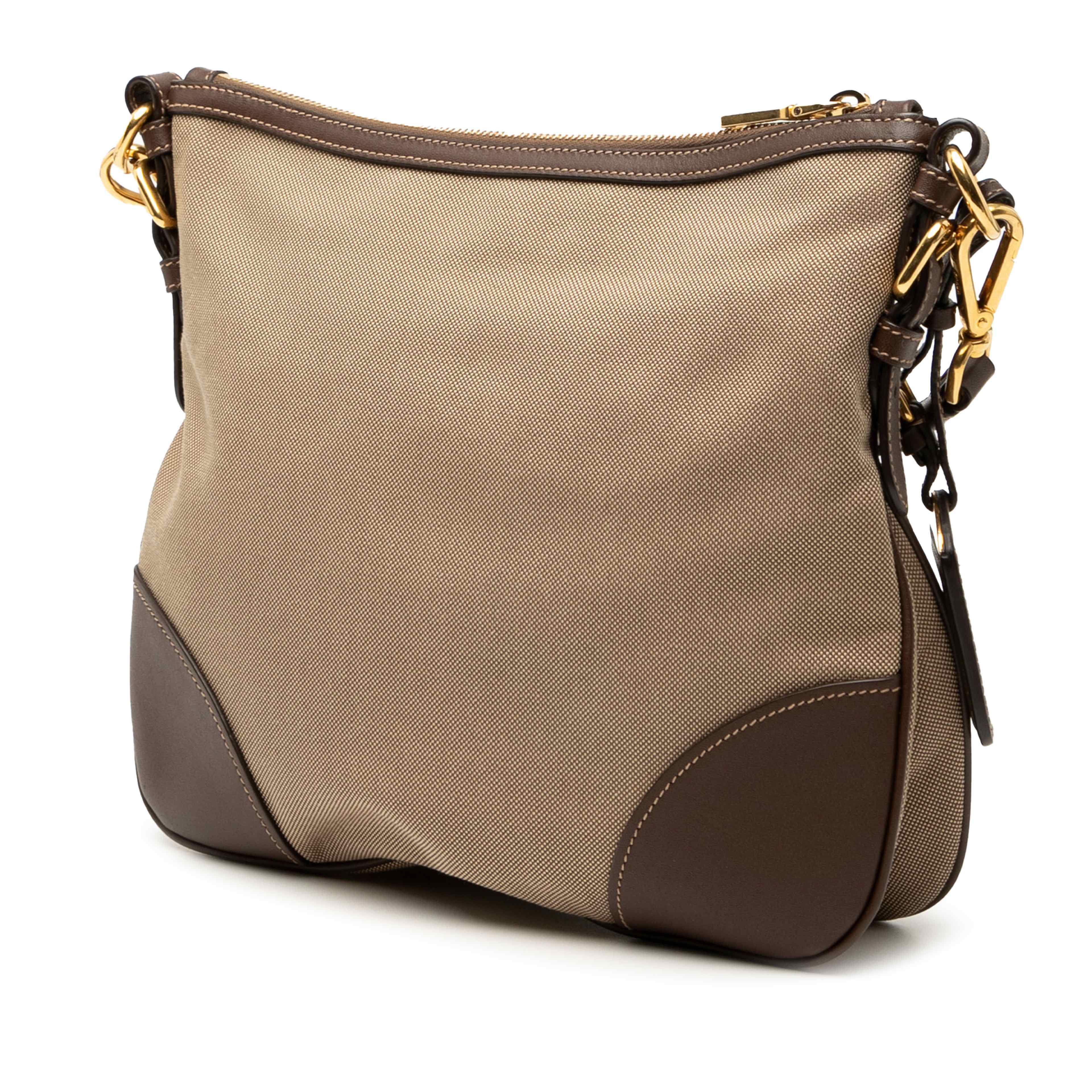 Prada Canvas Canapa Logo Crossbody, från Luxclusif, i färgen beige. Klicka för att öppna bilden i stort format