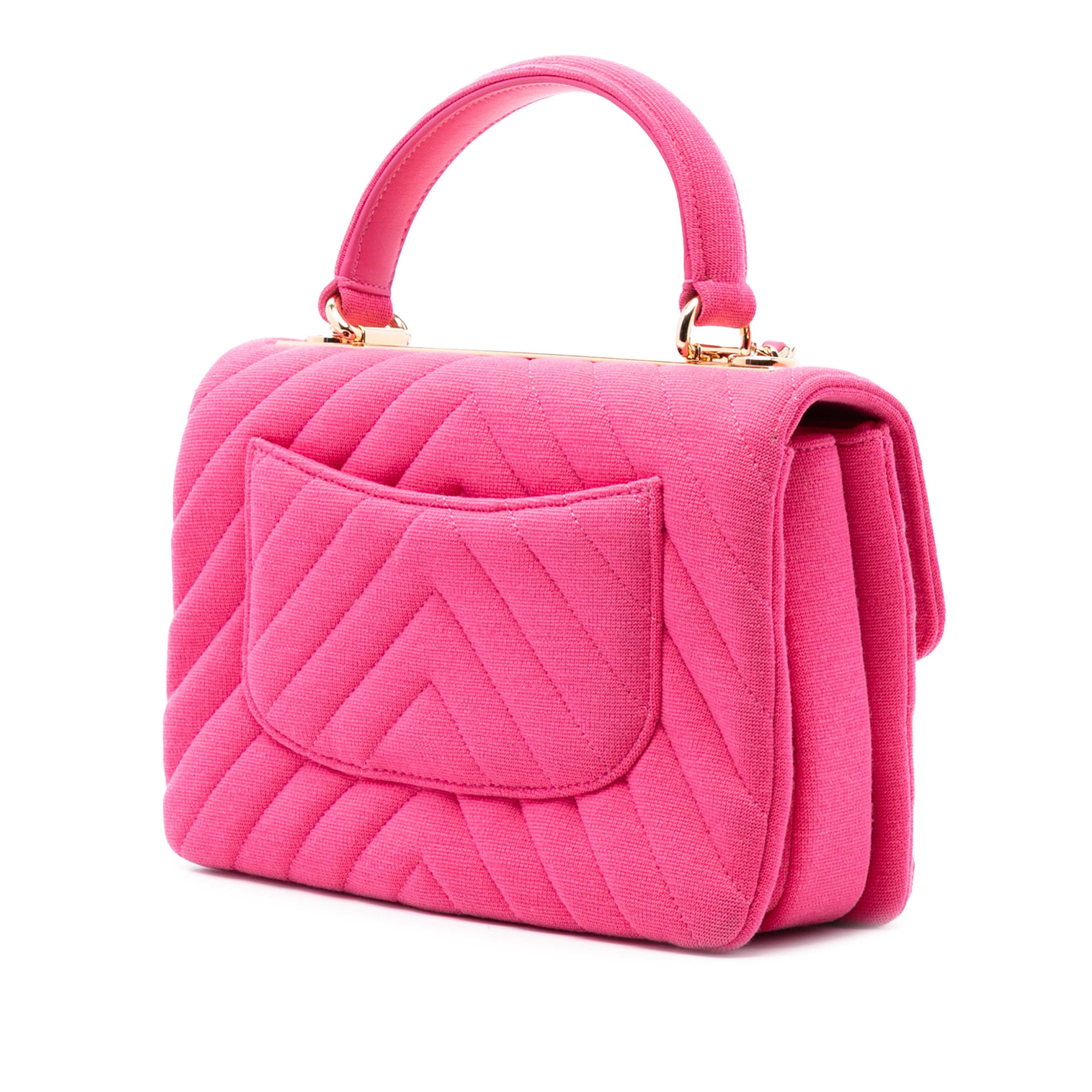 Chanel Small Chevron Jersey Trendy Cc Top Handle Flap, från Luxclusif, i färgen hot pink. Klicka för att öppna bilden i stort format