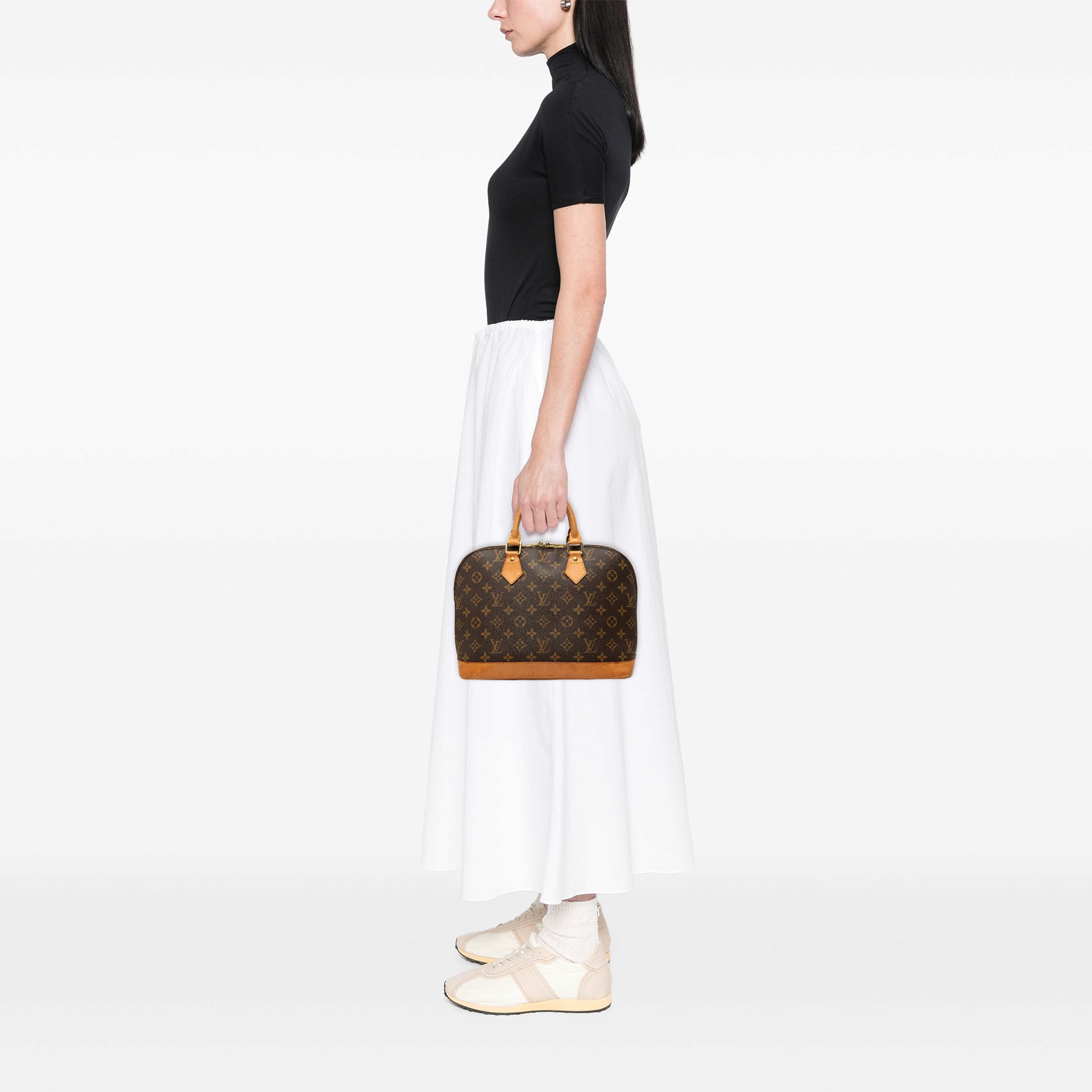 Louis Vuitton Monogram Alma Pm, från Luxclusif, i färgen brun. Klicka för att öppna bilden i stort format