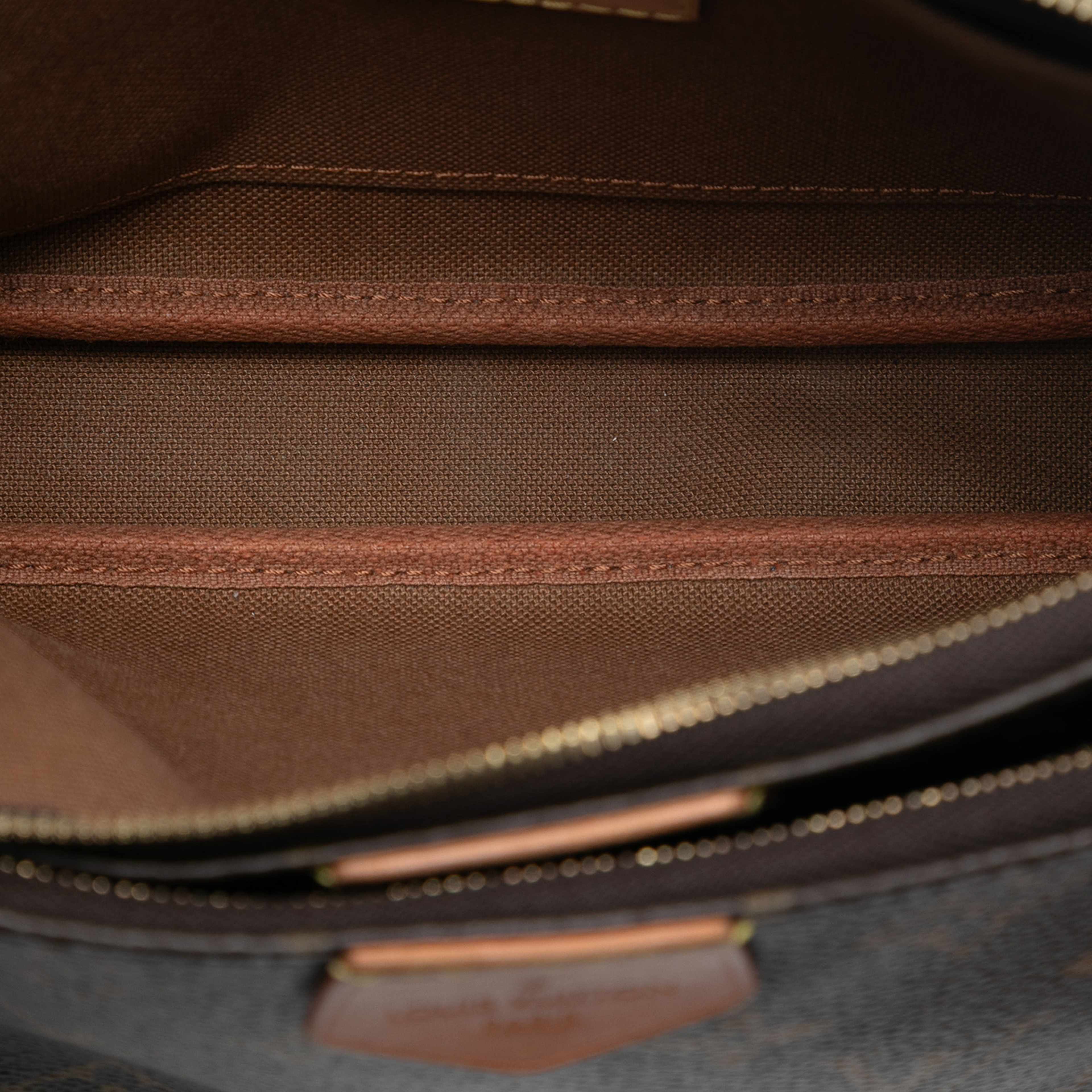 Louis Vuitton Monogram Multi Pochette Accessoires, från Luxclusif, i färgen brown. Klicka för att öppna bilden i stort format