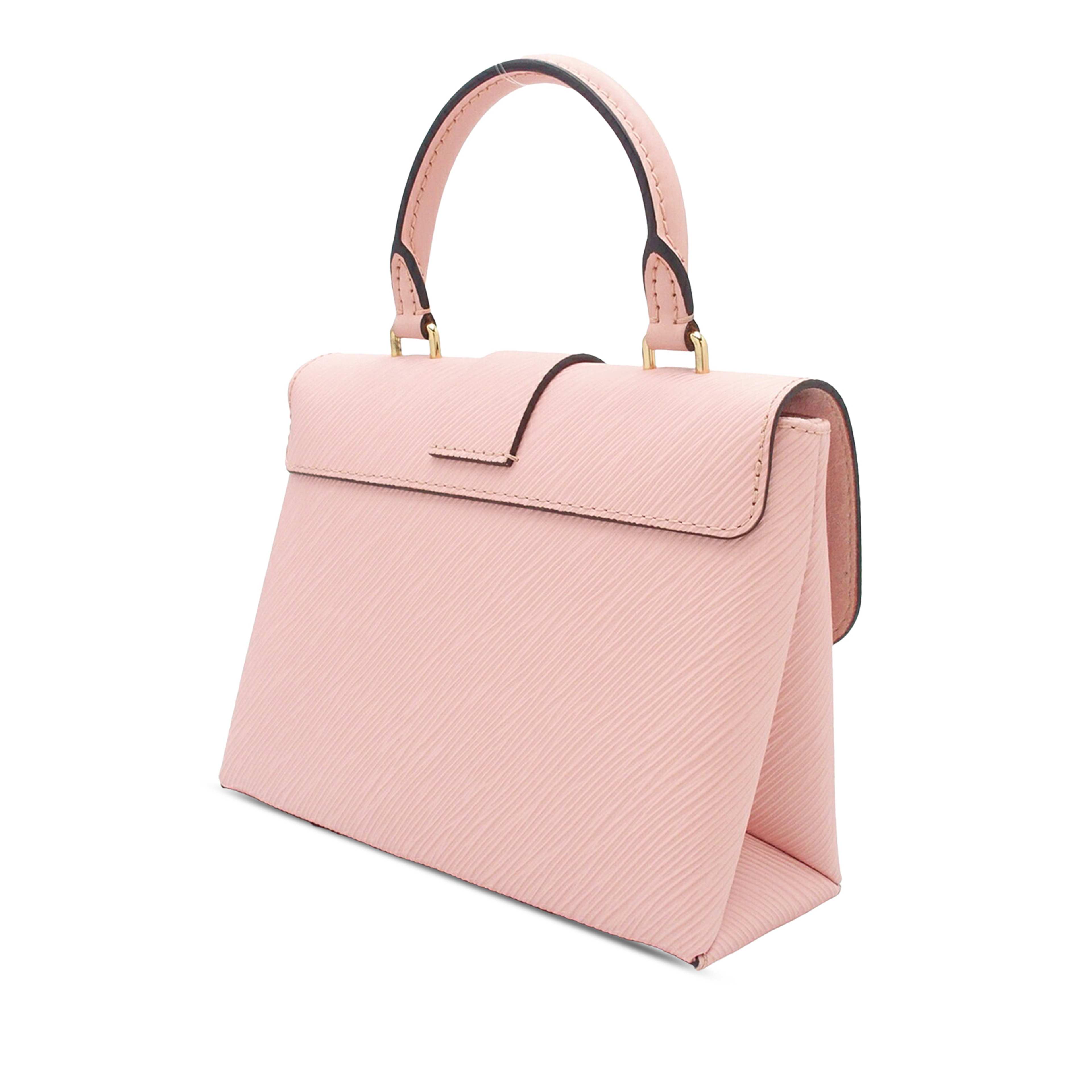 Louis Vuitton Epi Locky Bb, från Luxclusif, i färgen light pink. Klicka för att öppna bilden i stort format