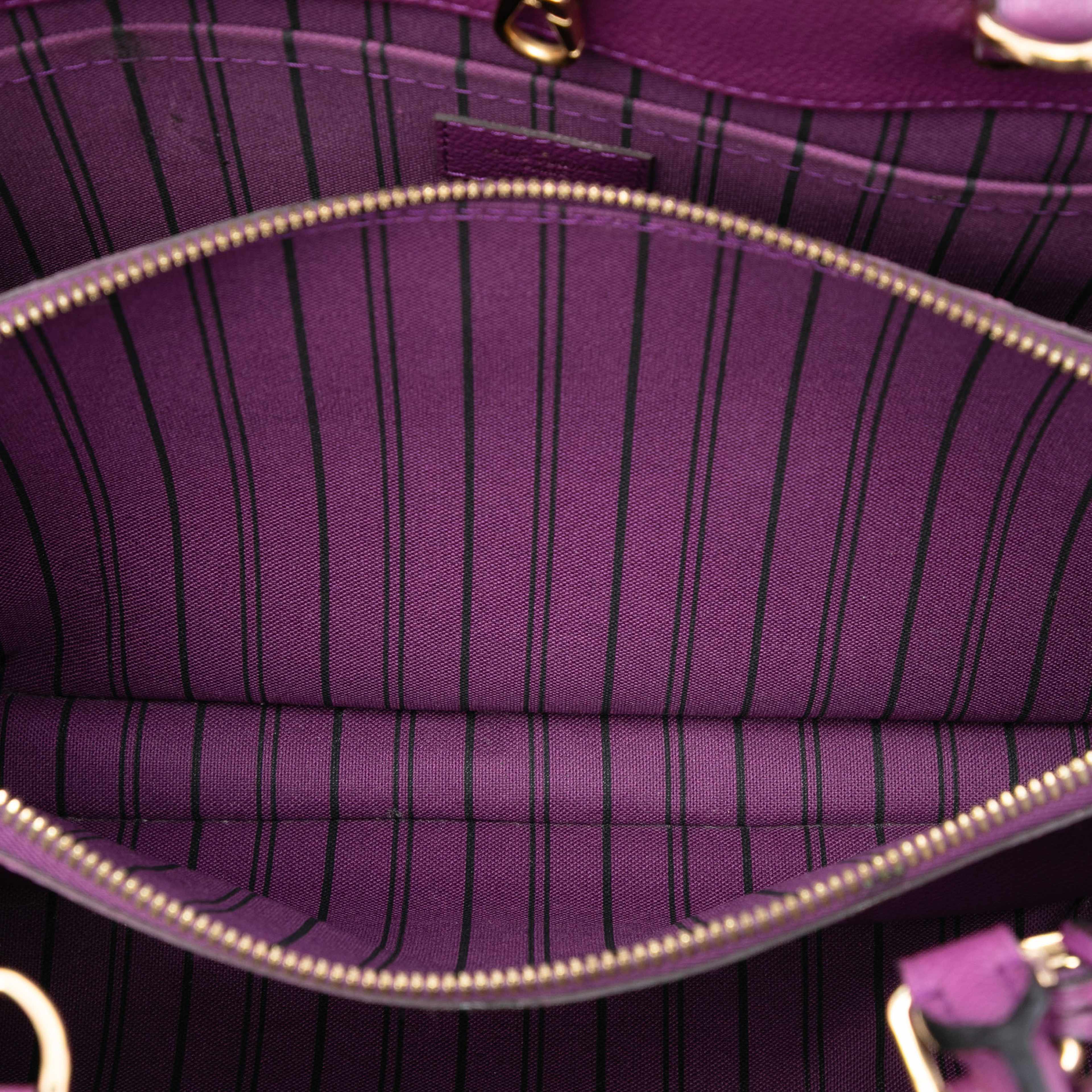 Louis Vuitton Monogram Empreinte Montaigne Mm, från Luxclusif, i färgen purple. Klicka för att öppna bilden i stort format