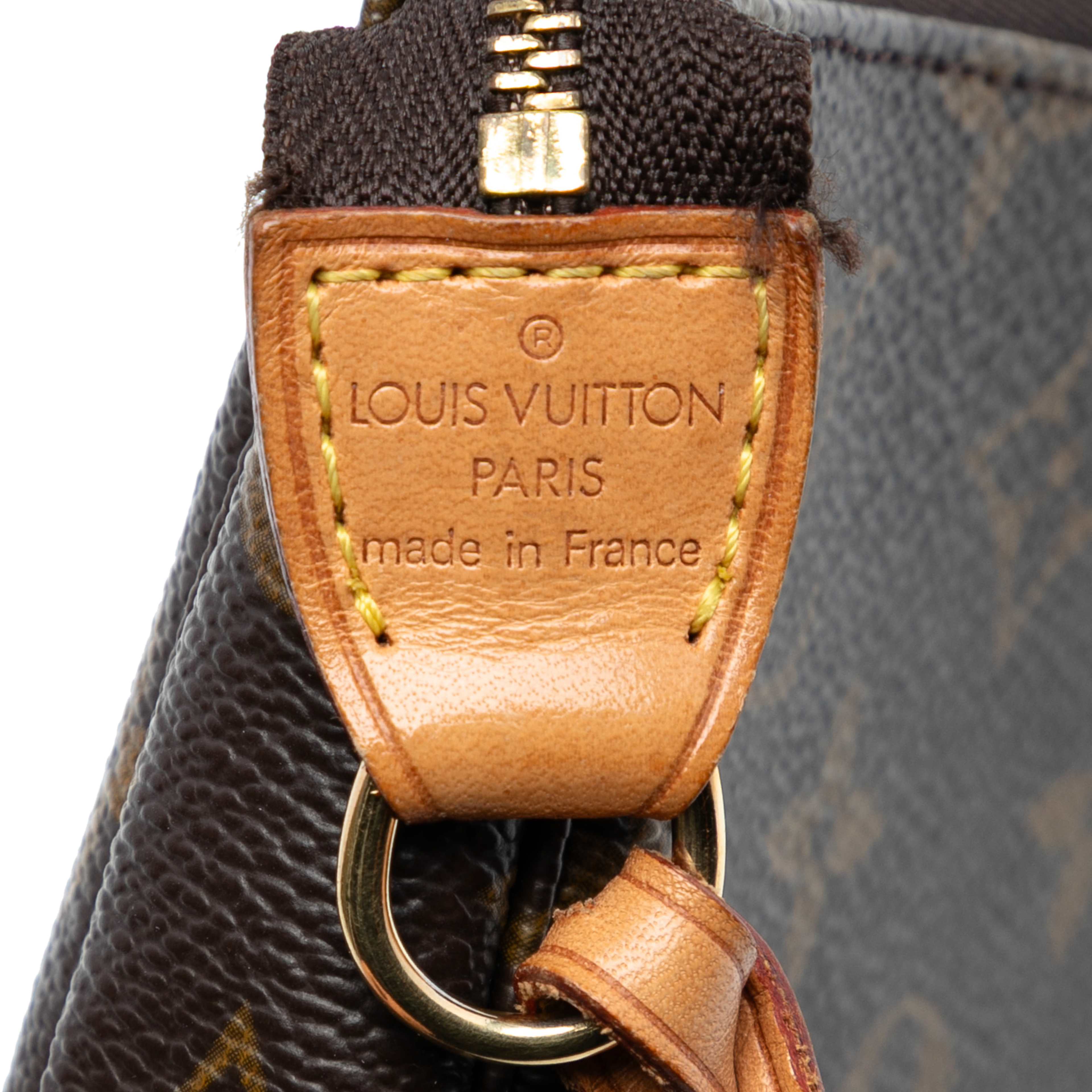 Louis Vuitton Monogram Pochette Accessoires, från Luxclusif, i färgen brown. Klicka för att öppna bilden i stort format