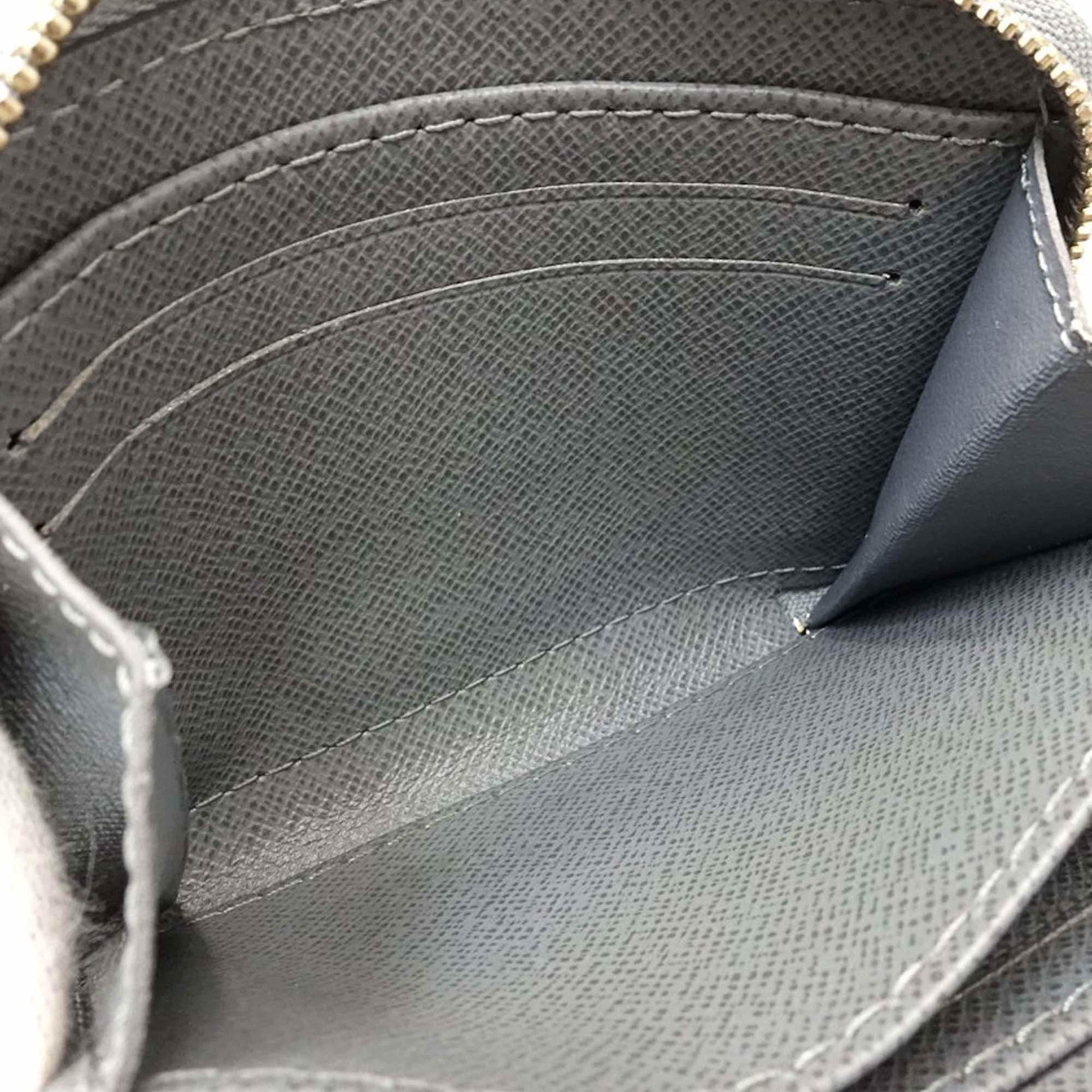 Louis Vuitton Monogram Denim Zippy Coin Purse, från Luxclusif, i färgen gray. Klicka för att öppna bilden i stort format
