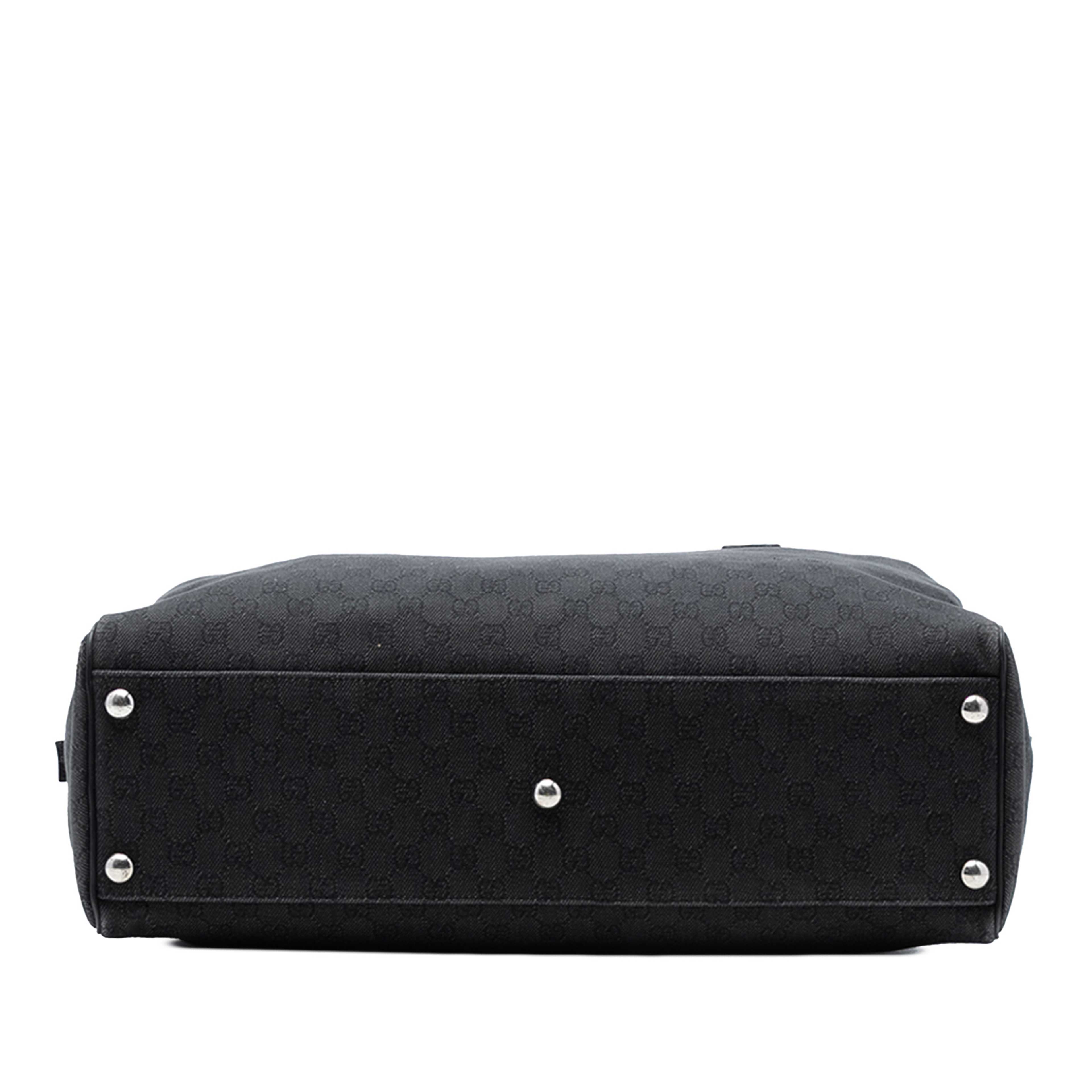 Gucci Gg Denim Travel Bag, från Luxclusif, i färgen black. Klicka för att öppna bilden i stort format