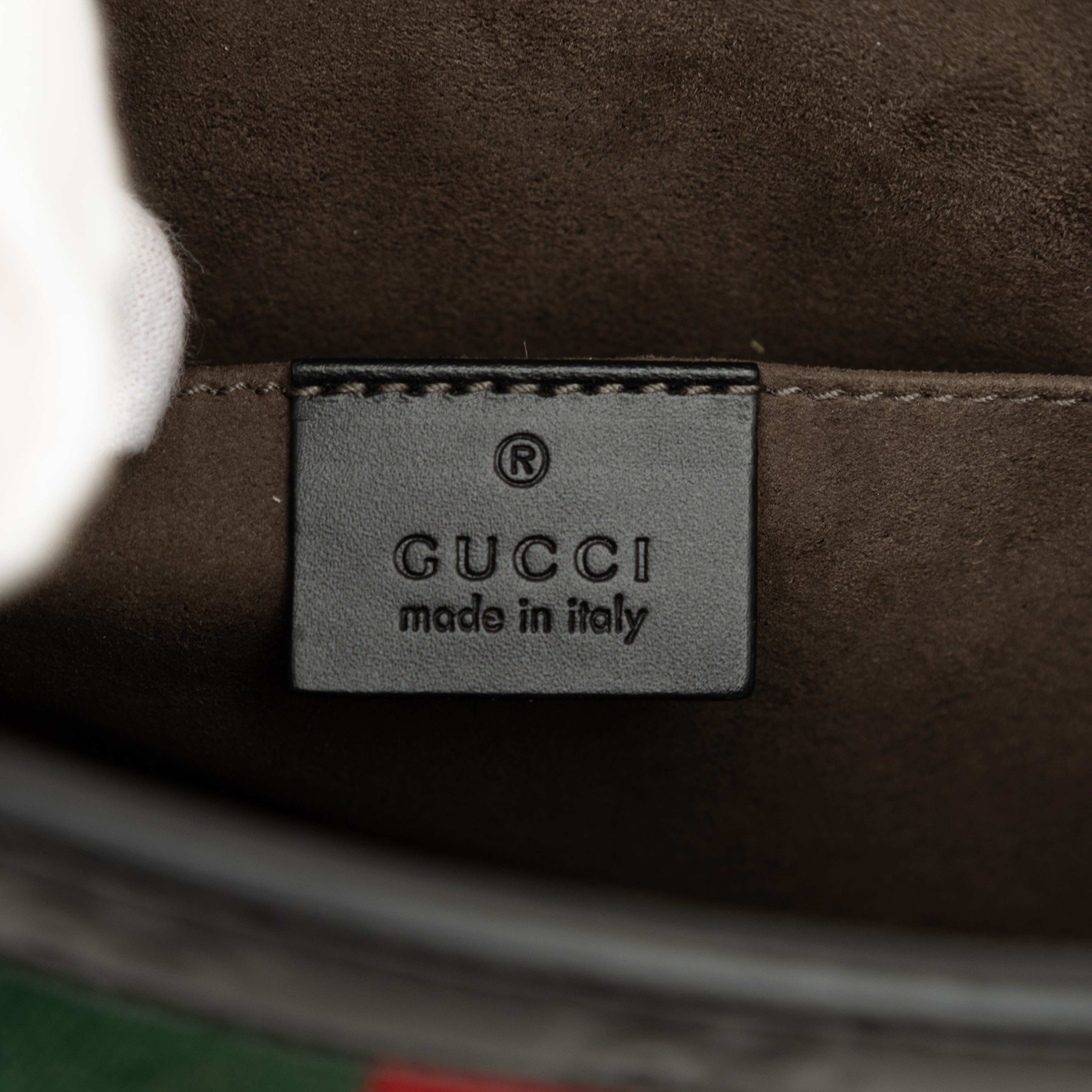 Gucci Guccissima Web Clutch, från Luxclusif, i färgen svart. Klicka för att öppna bilden i stort format