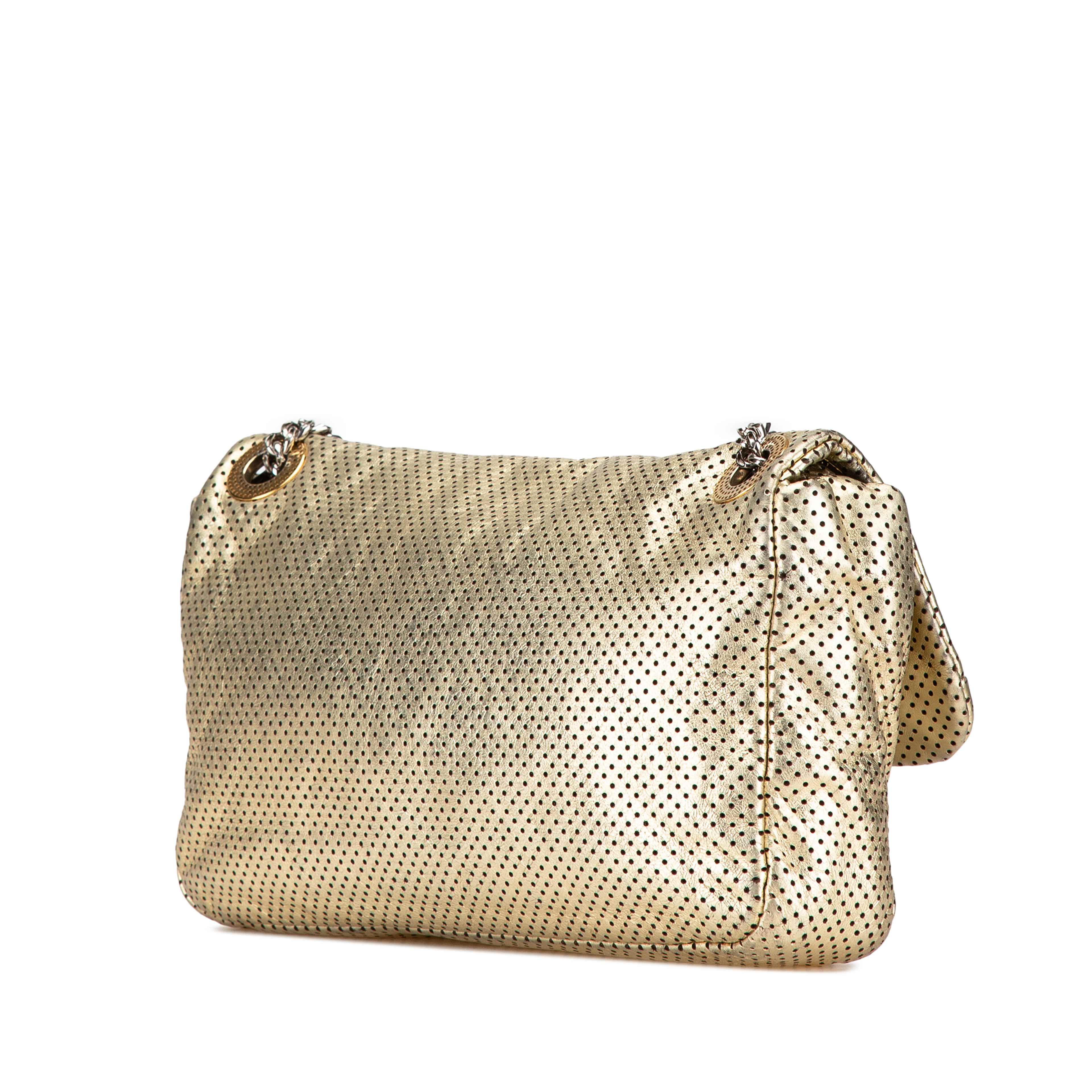 Chanel Medium Perforated Calfskin Reissue Drill Flap, från Luxclusif, i färgen light gold. Klicka för att öppna bilden i stort format