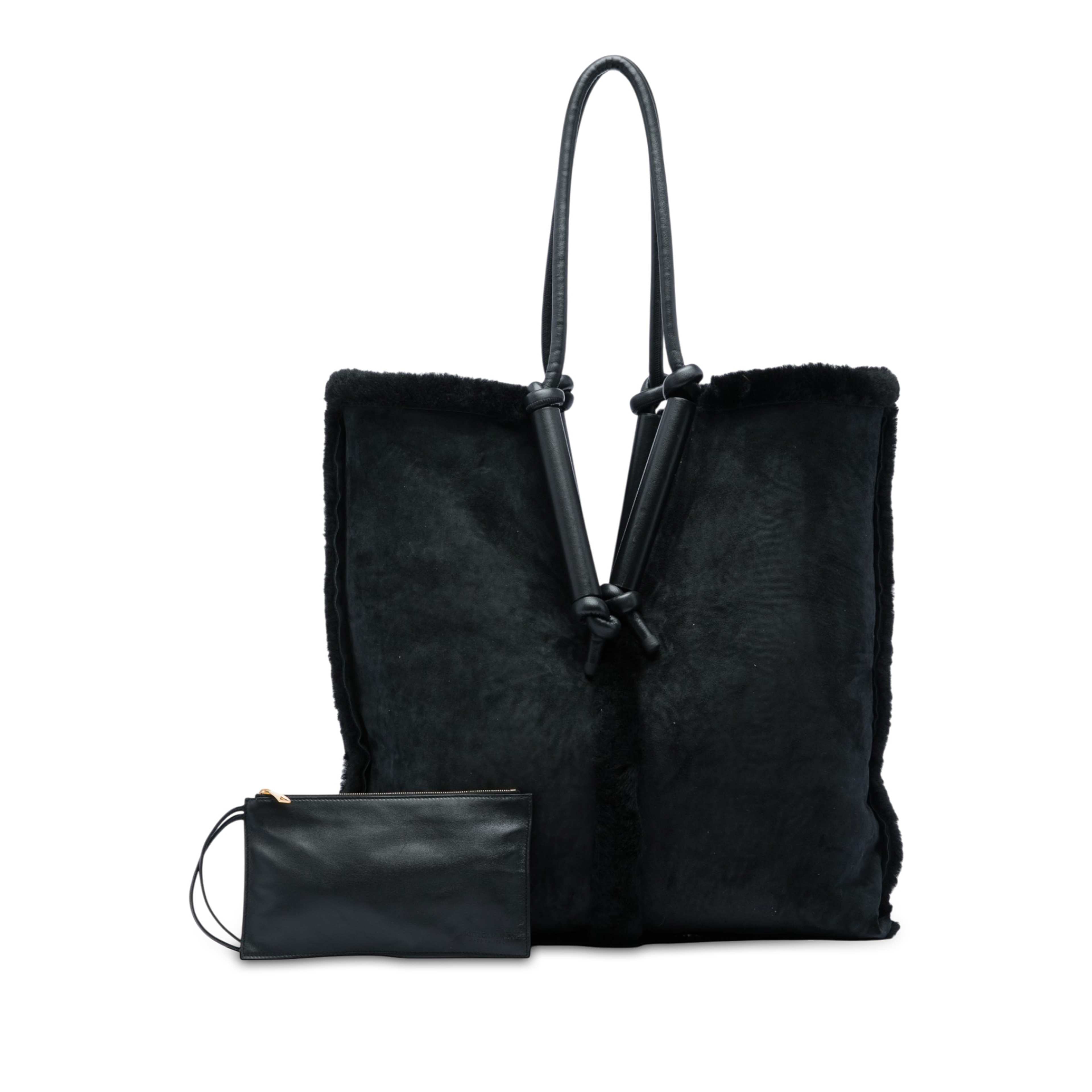 Bottega Veneta Suede And Shearling Bolster Reversible Tote, från Luxclusif, i färgen svart. Klicka för att öppna bilden i stort format