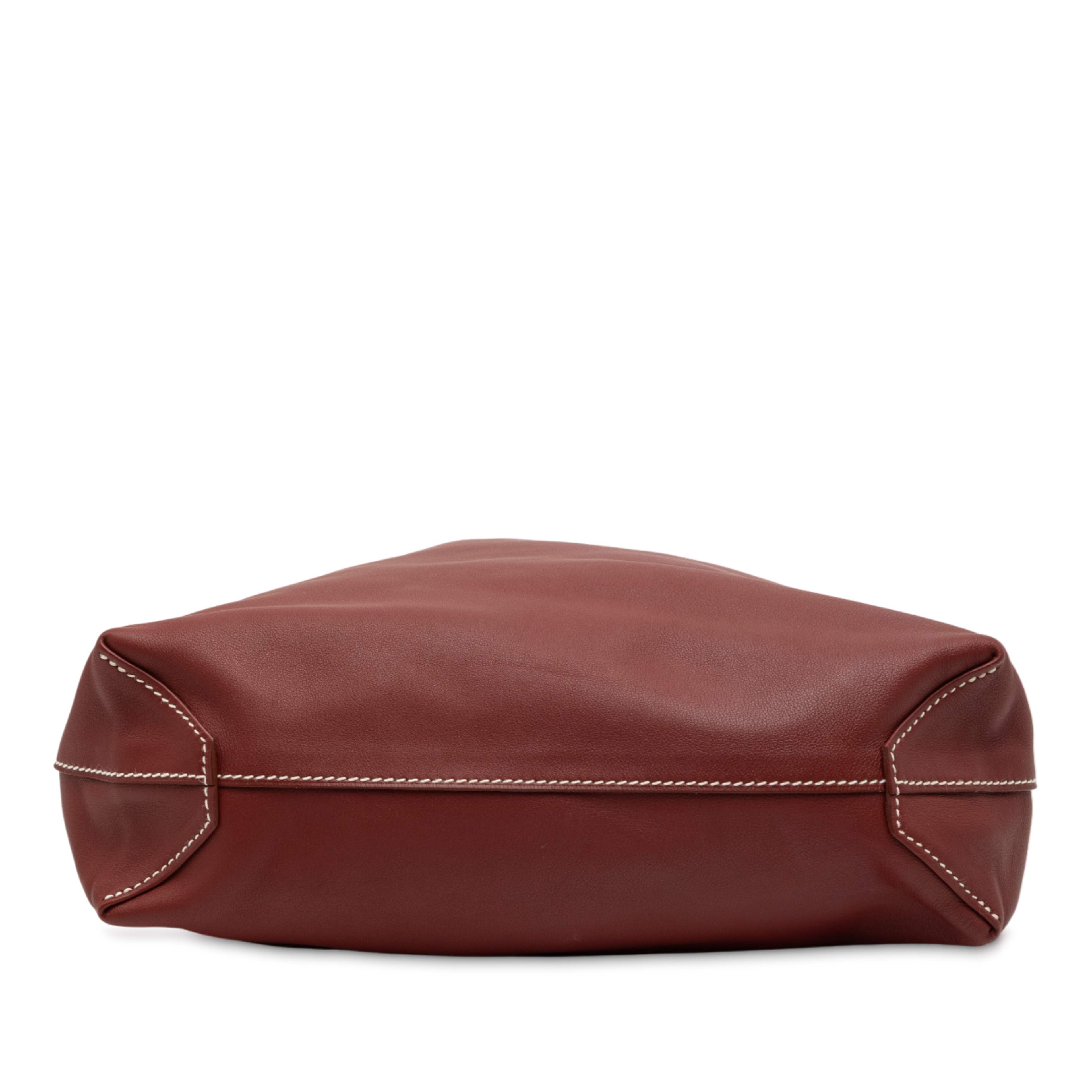 Hermès Veau Sikkim Double Sens 28, från Luxclusif, i färgen dark red. Klicka för att öppna bilden i stort format