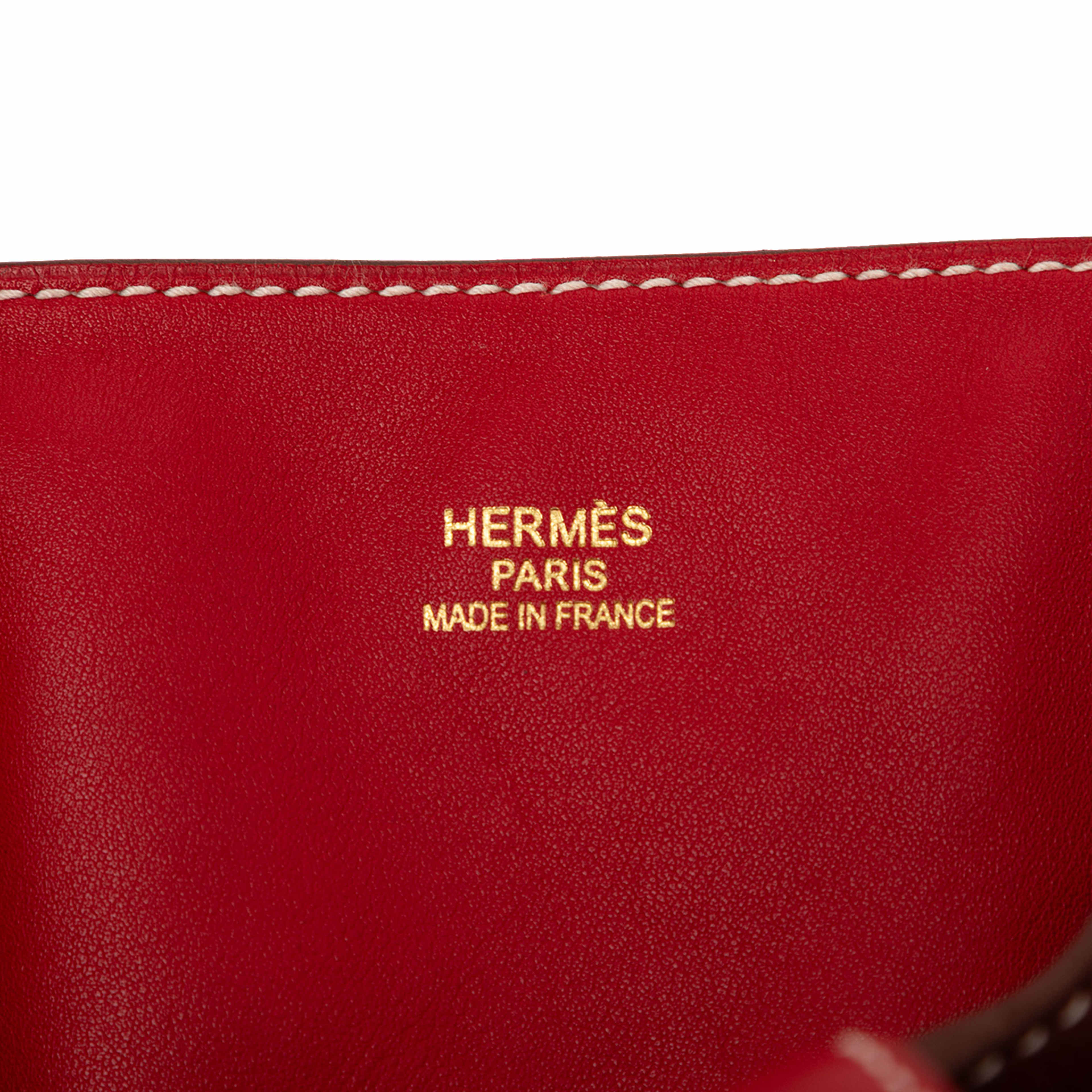 Hermès Veau Sikkim Double Sens 28, från Luxclusif, i färgen dark red. Klicka för att öppna bilden i stort format