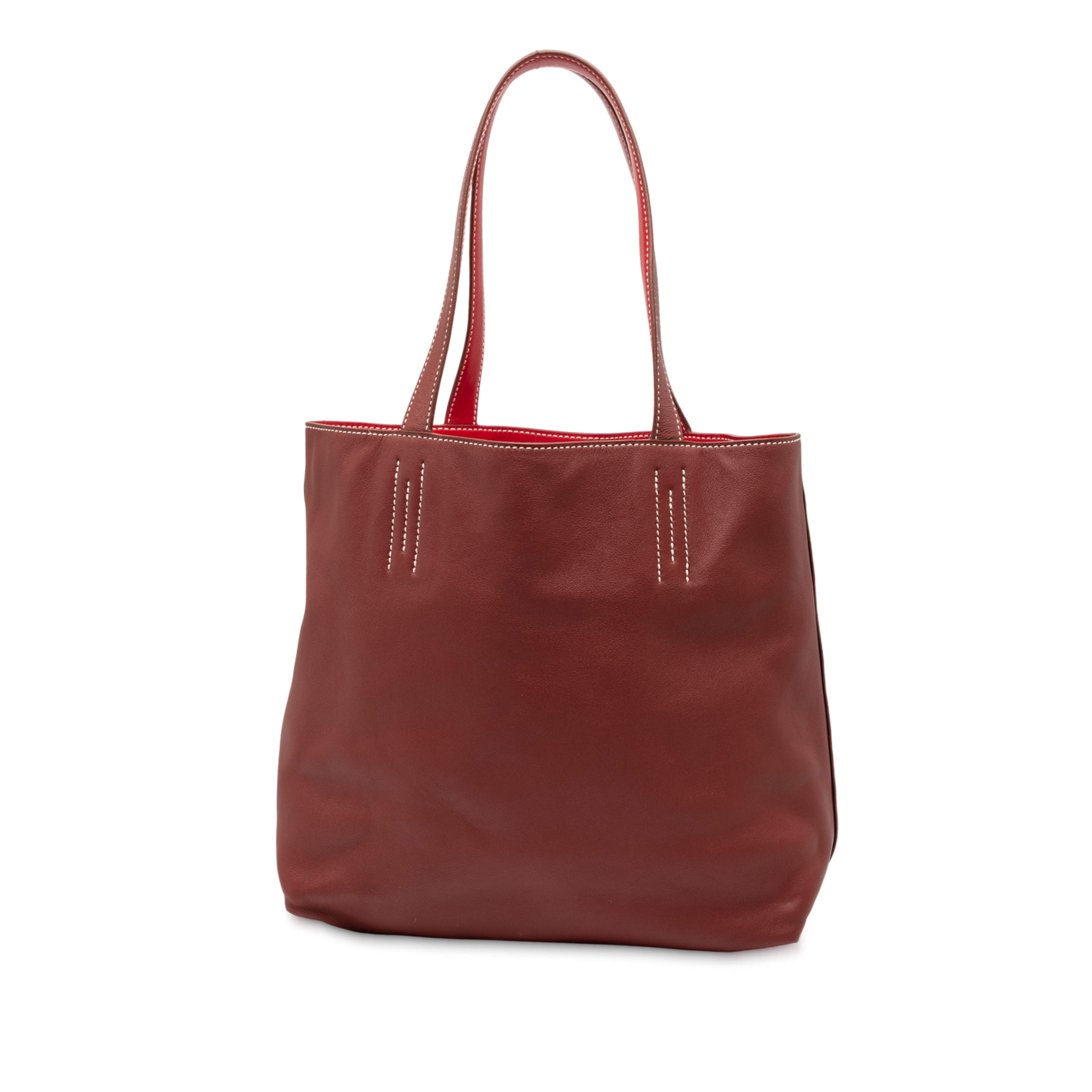 Hermès Veau Sikkim Double Sens 28, från Luxclusif, i färgen dark red. Klicka för att öppna bilden i stort format