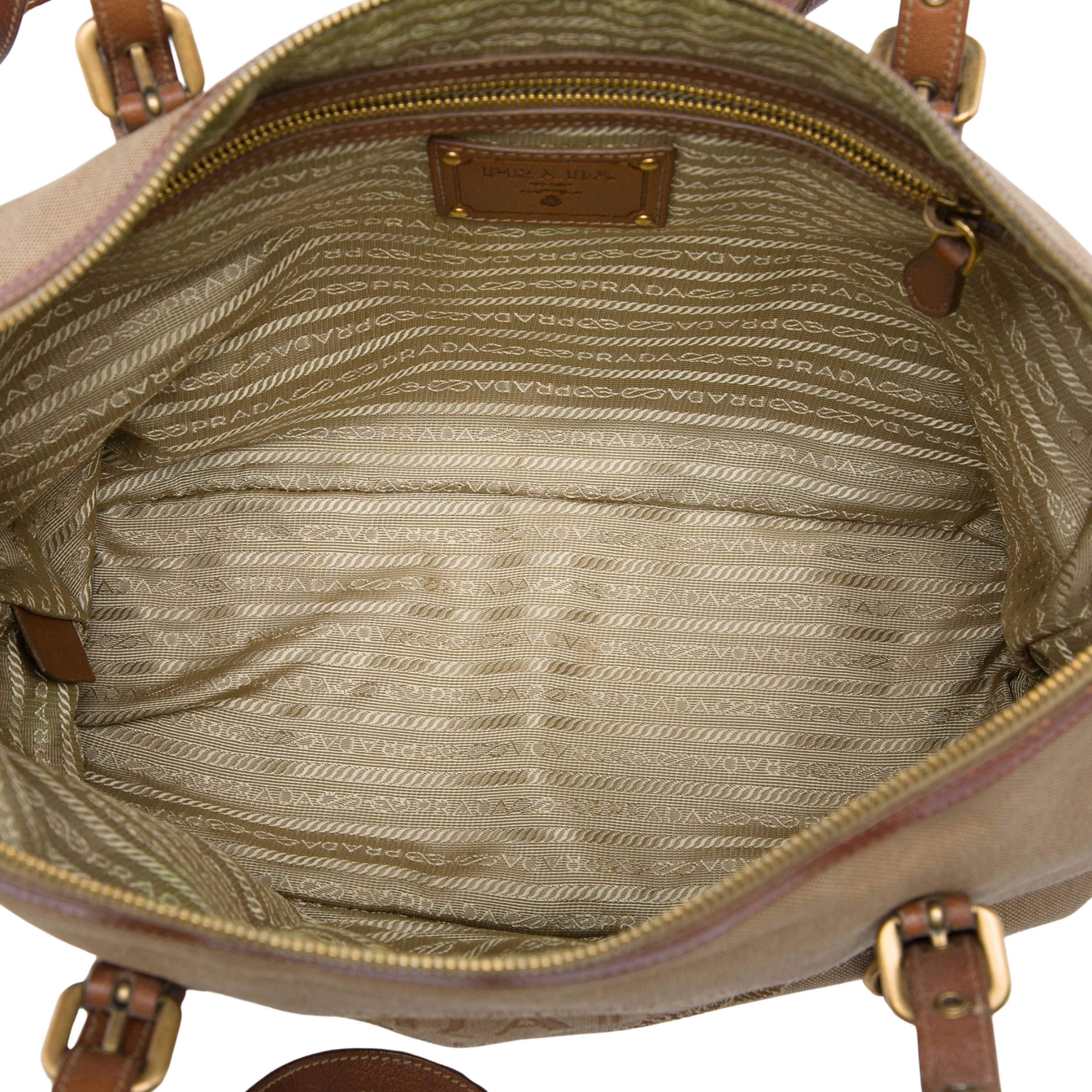 Prada Canvas Canapa Logo Tote, från Luxclusif, i färgen brun. Klicka för att öppna bilden i stort format