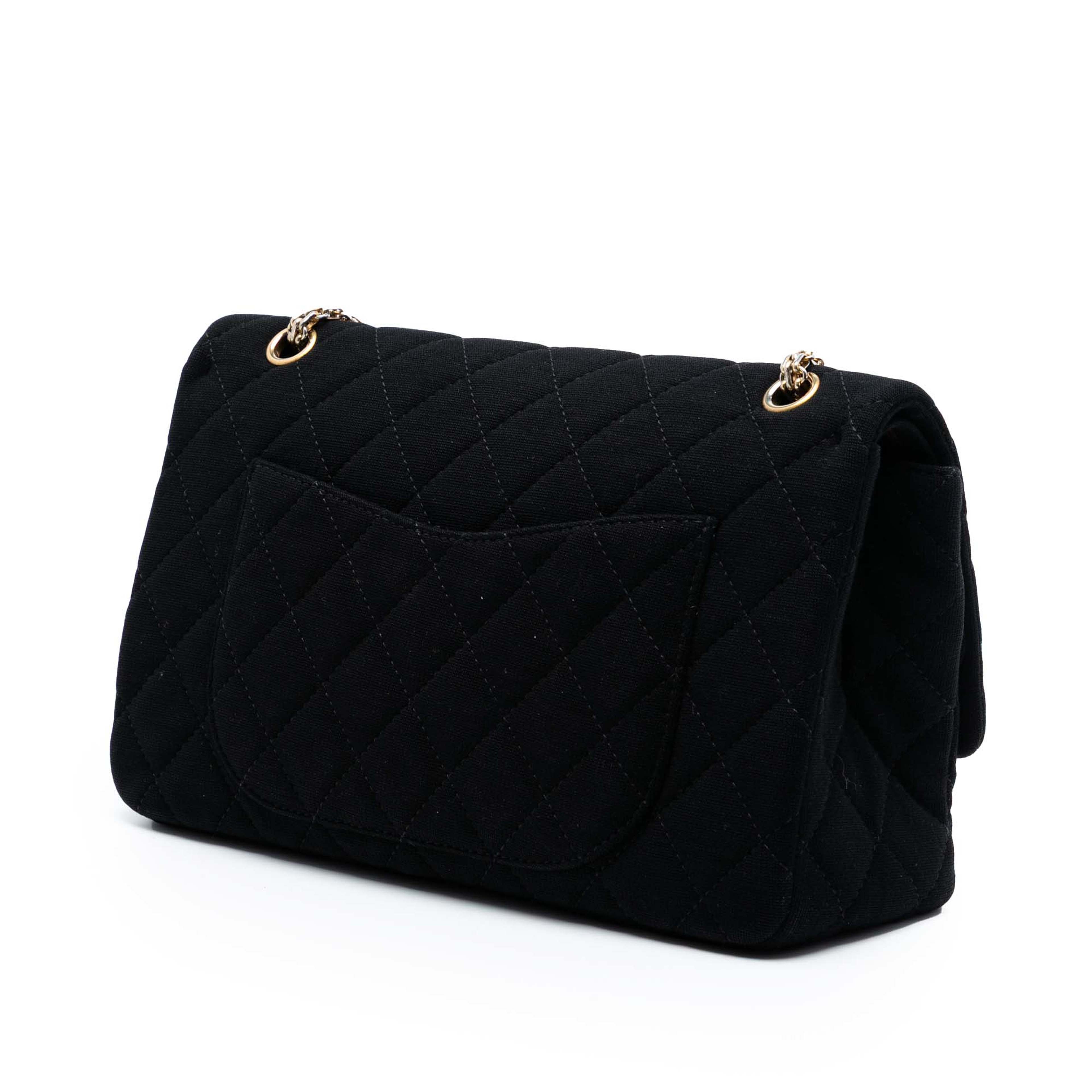 Chanel Reissue 2.55 Quilted Jersey Double Flap 227, från Luxclusif, i färgen black. Klicka för att öppna bilden i stort format