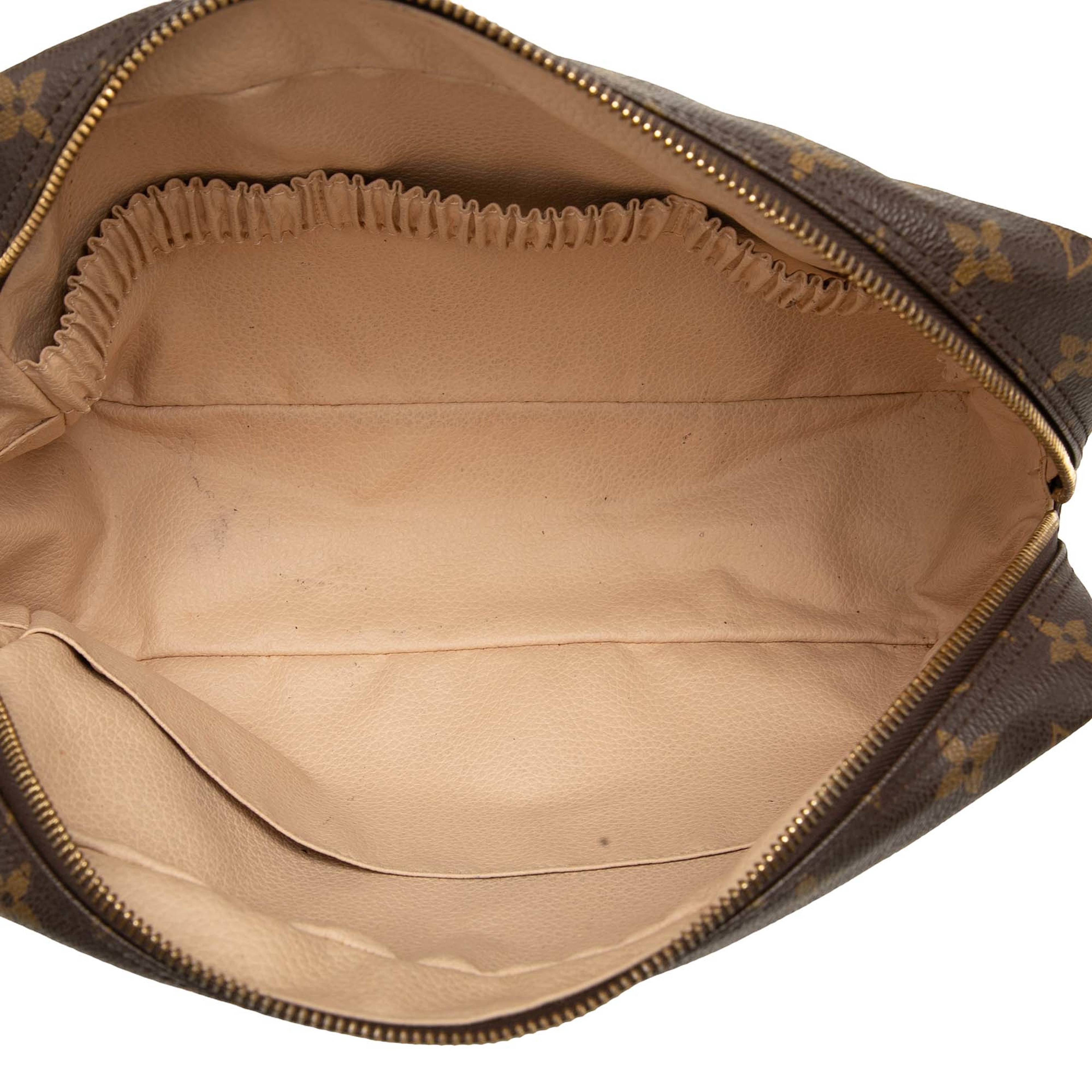 Louis Vuitton Monogram Trousse Toilette 28, från Luxclusif, i färgen brun. Klicka för att öppna bilden i stort format