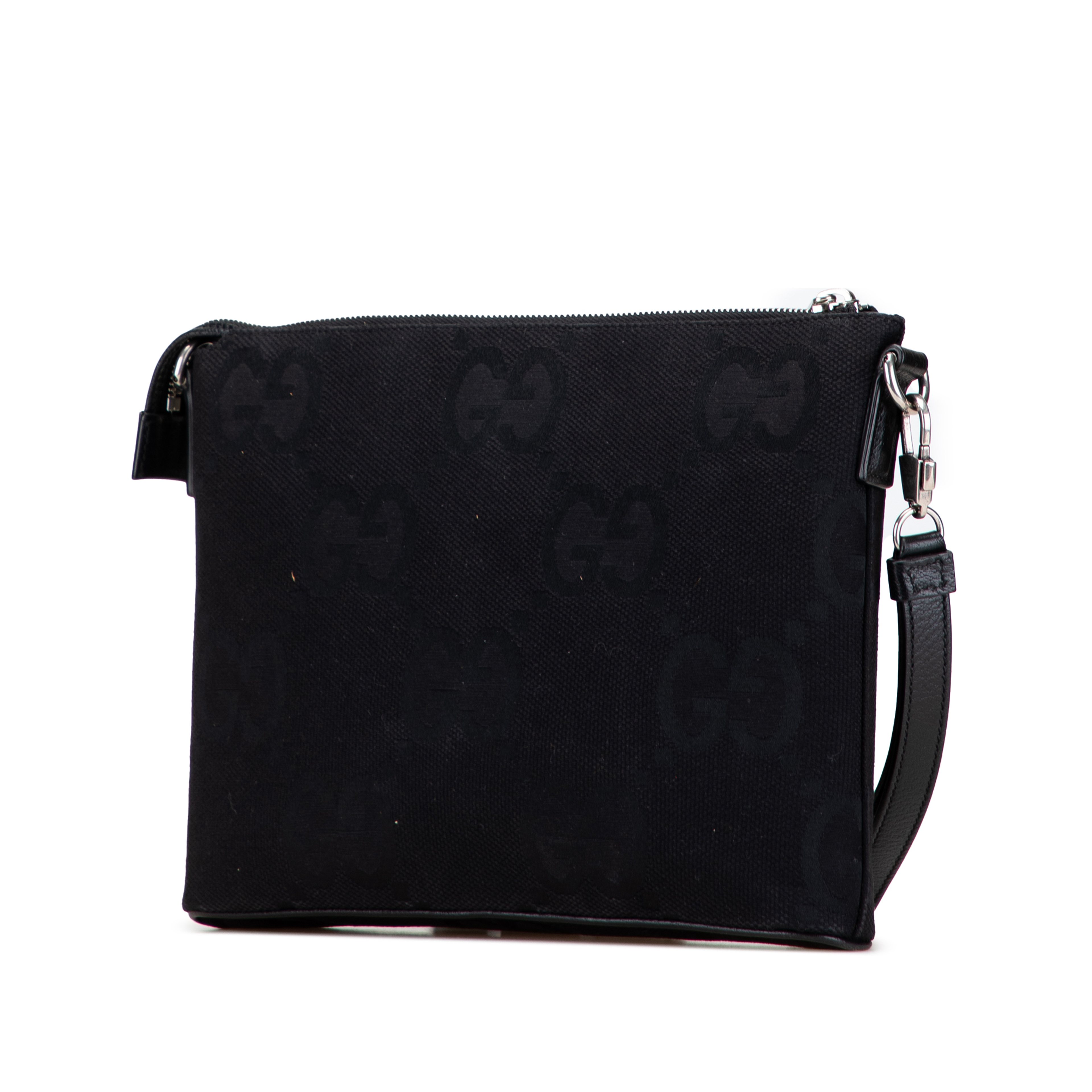 Gucci Jumbo Gg Canvas Clutch On Strap, från Luxclusif, i färgen svart. Klicka för att öppna bilden i stort format
