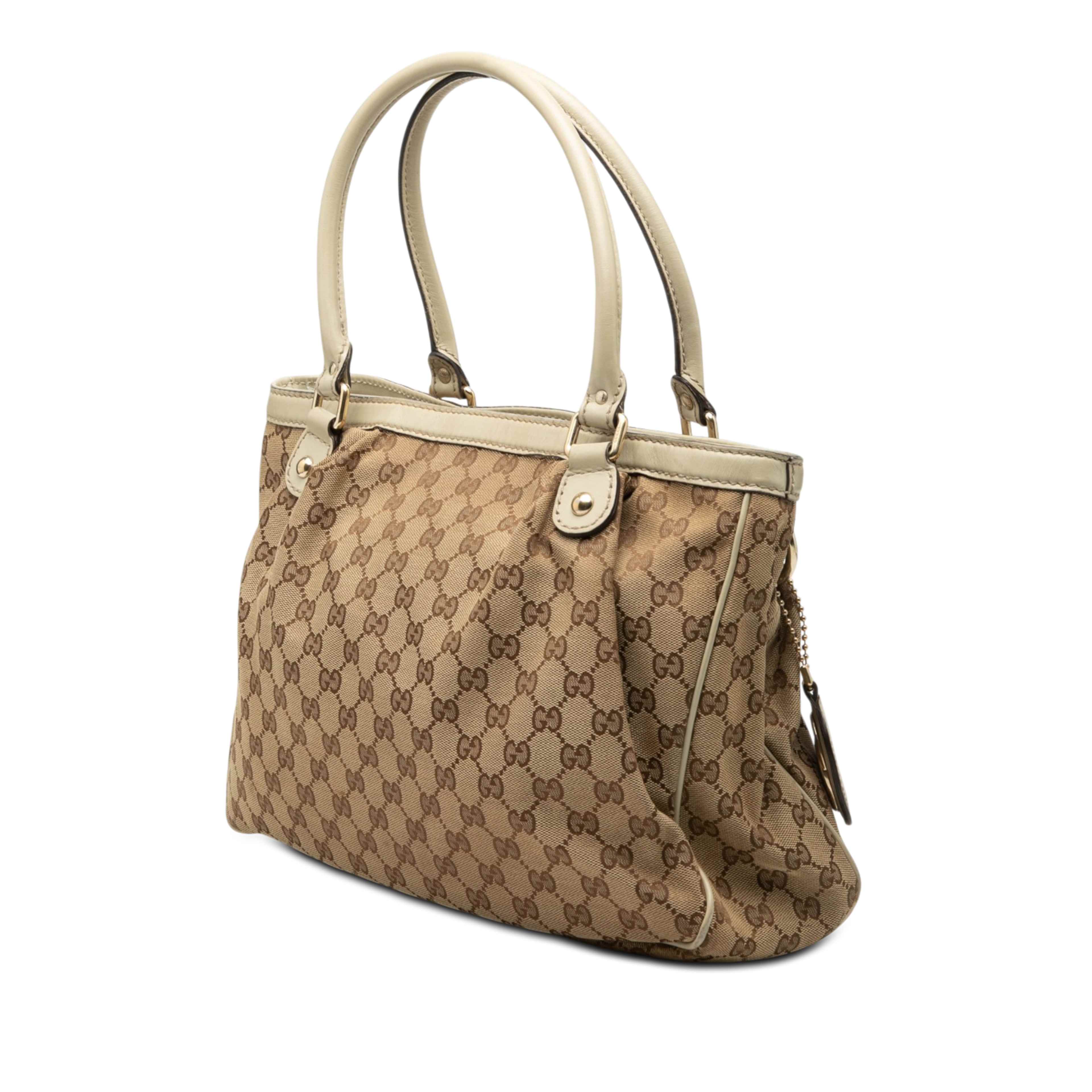 Gucci Gg Canvas Sukey Tote, från Luxclusif, i färgen vit. Klicka för att öppna bilden i stort format