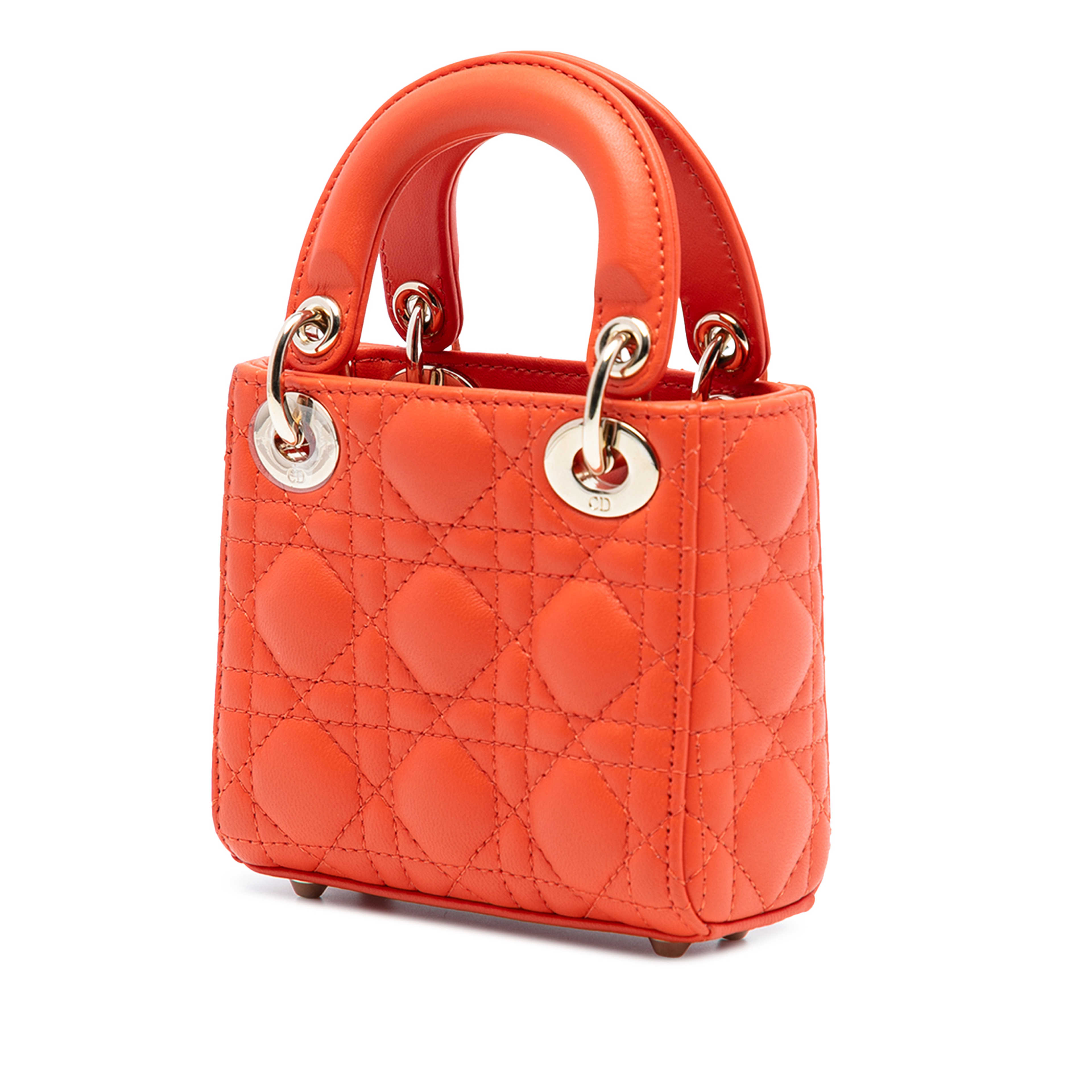 Dior Micro Lambskin Cannage Lady Dior, från Luxclusif, i färgen orange. Klicka för att öppna bilden i stort format