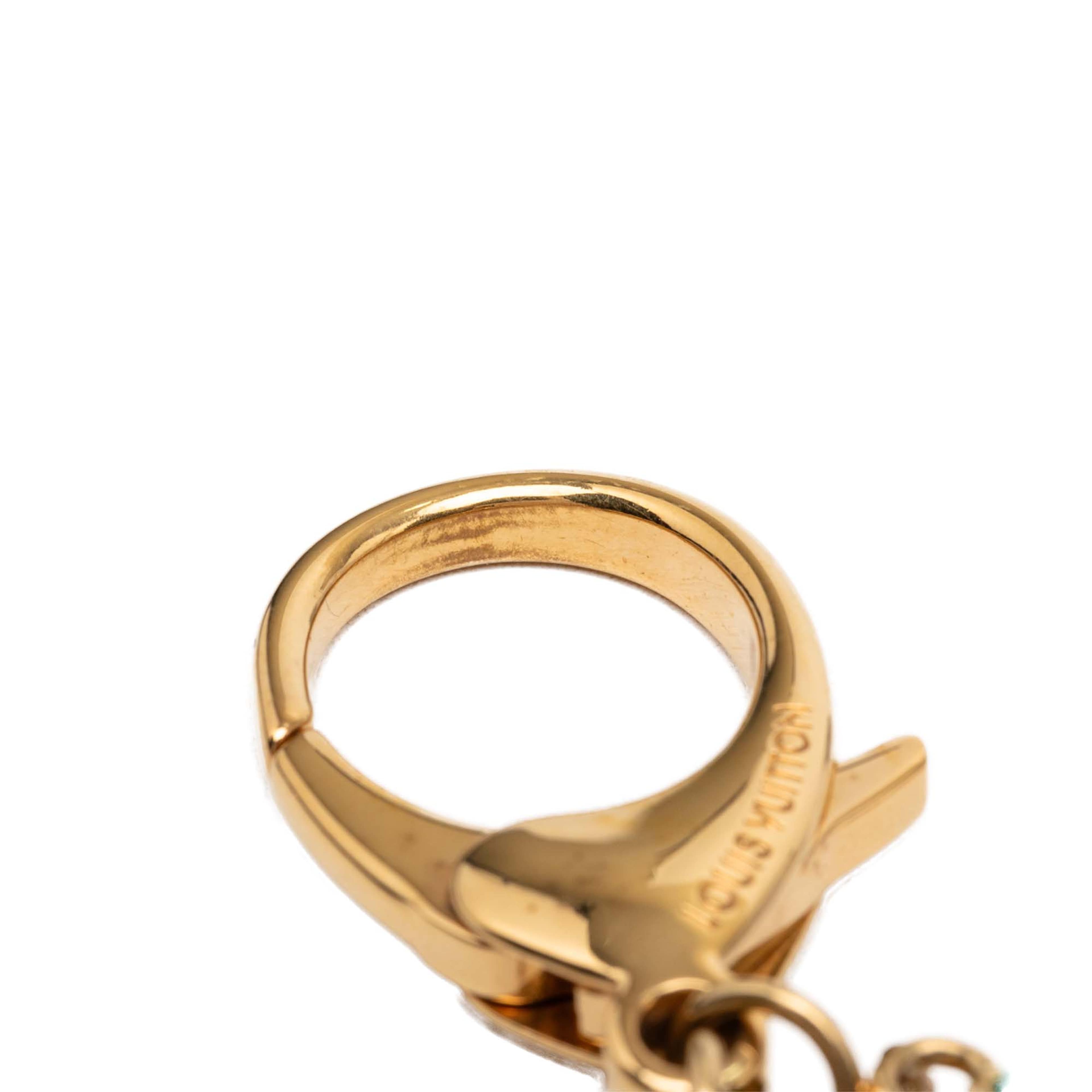Louis Vuitton Gold Plated And Resin Naif Bag Charm, från Luxclusif, i färgen guld. Klicka för att öppna bilden i stort format
