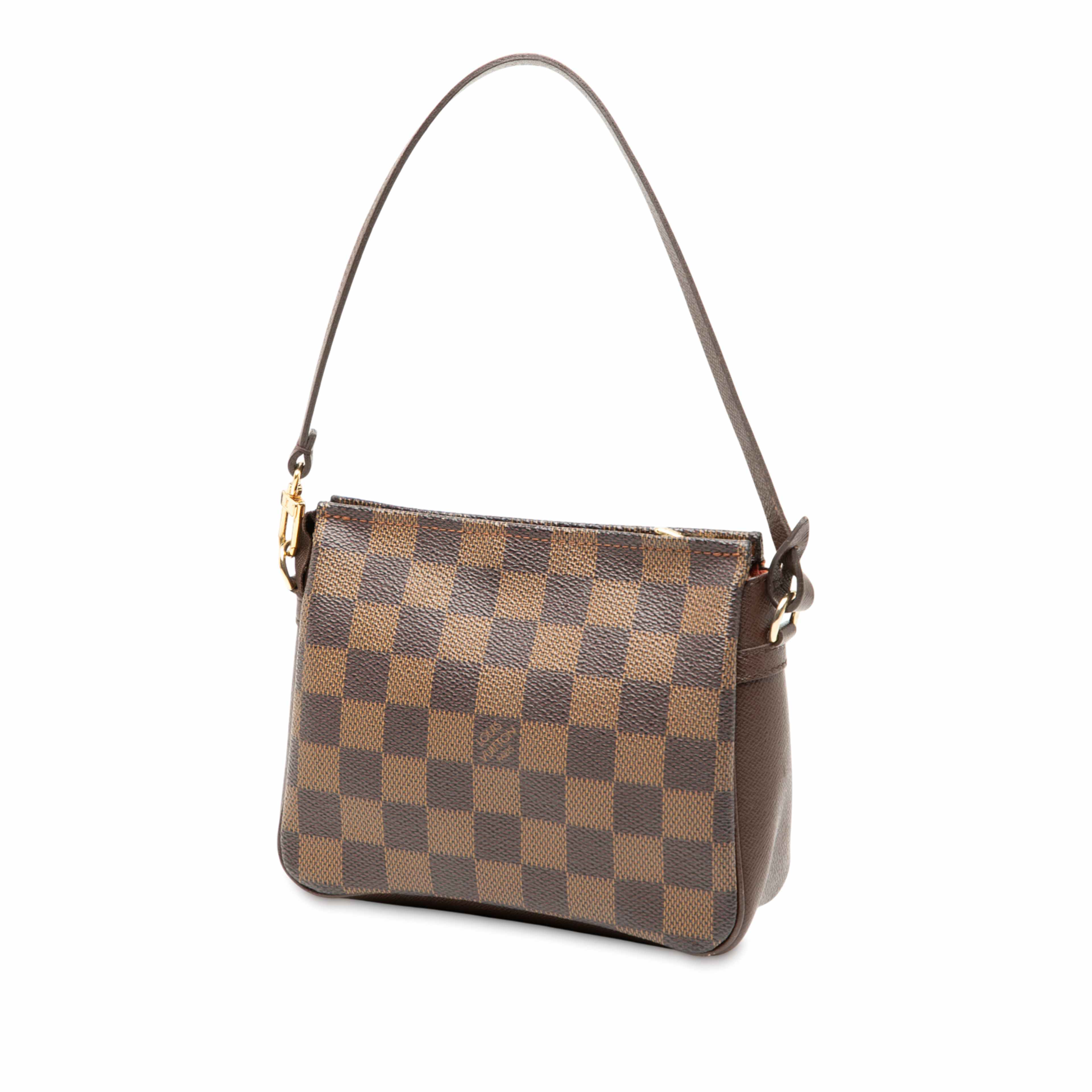 Louis Vuitton Damier Ebene Trousse Pochette, från Luxclusif, i färgen brown. Klicka för att öppna bilden i stort format