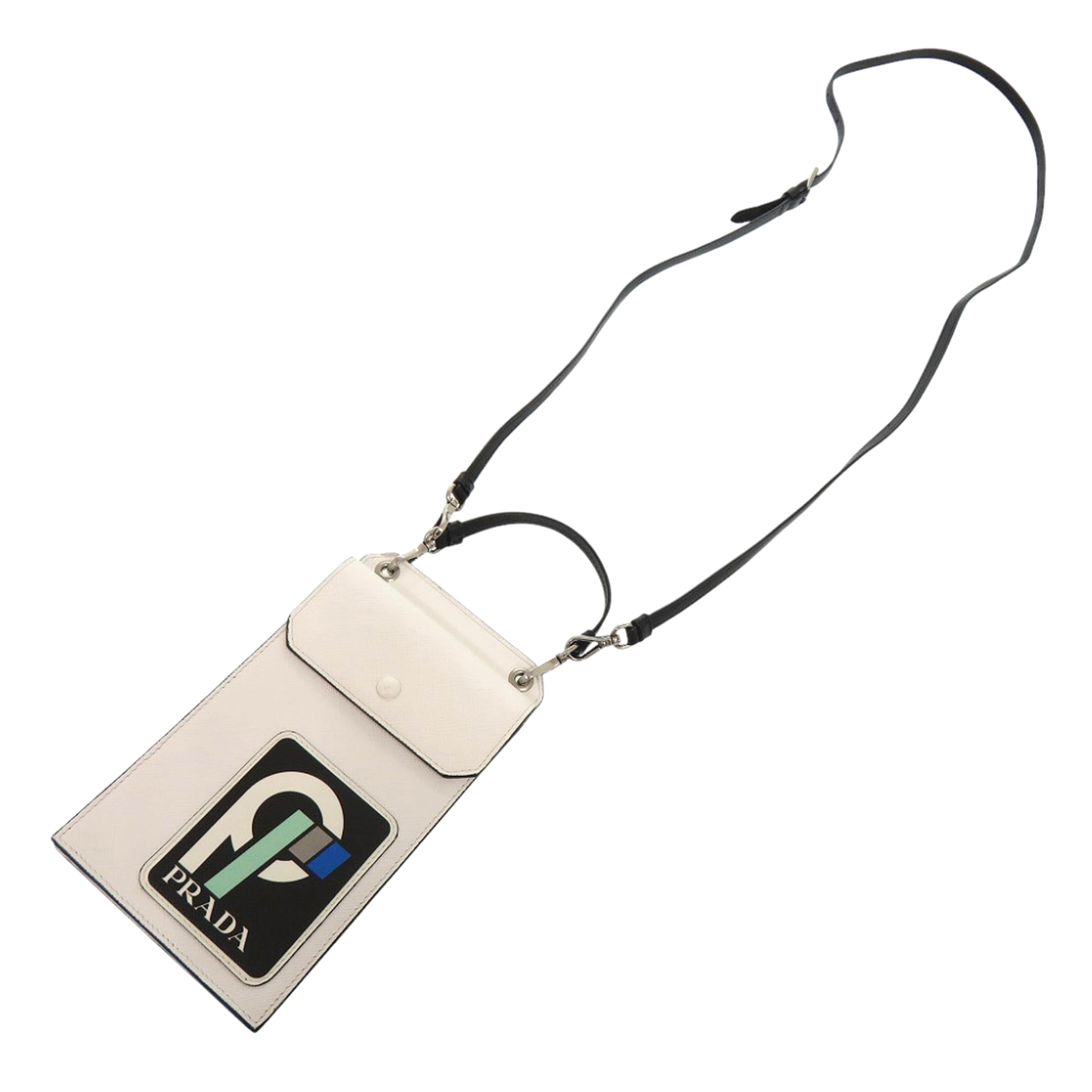 Prada Saffiano Patch Phone Holder, från Luxclusif, i färgen vit. Klicka för att öppna bilden i stort format