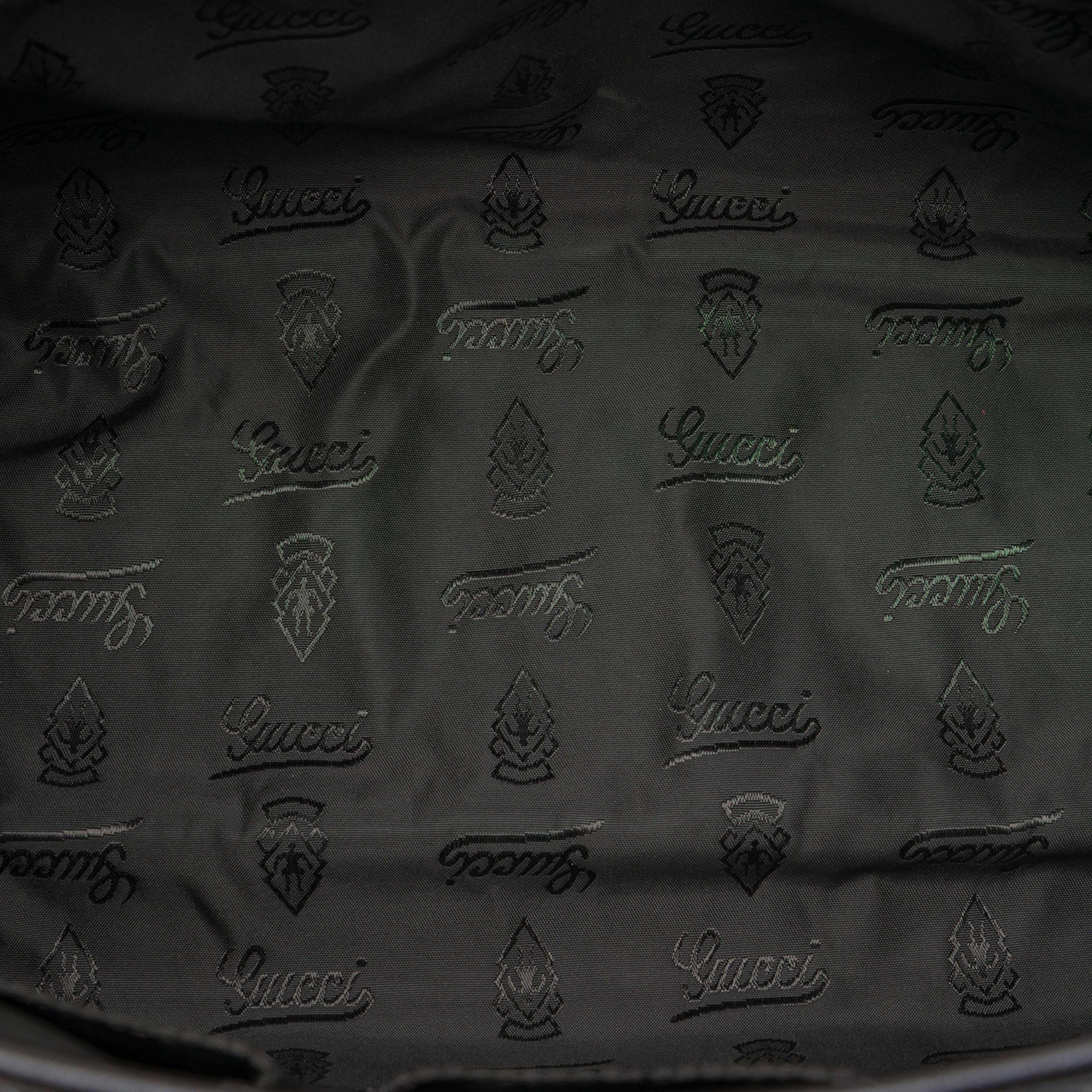 Gucci Guccissima Messenger Bag, från Luxclusif, i färgen svart. Klicka för att öppna bilden i stort format