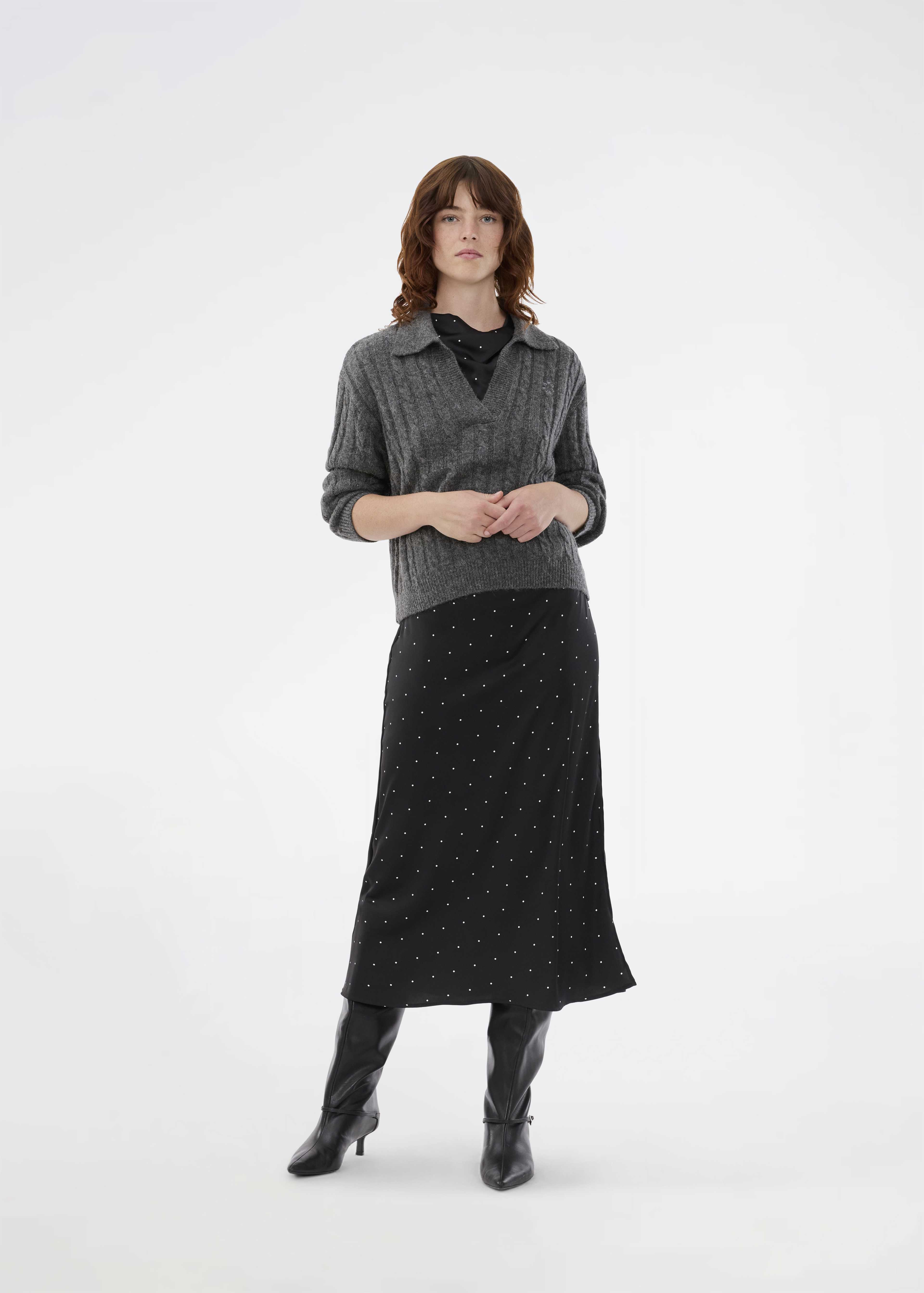 Risemd Polo, från Modström, i färgen dark grey melange. Klicka för att öppna bilden i stort format