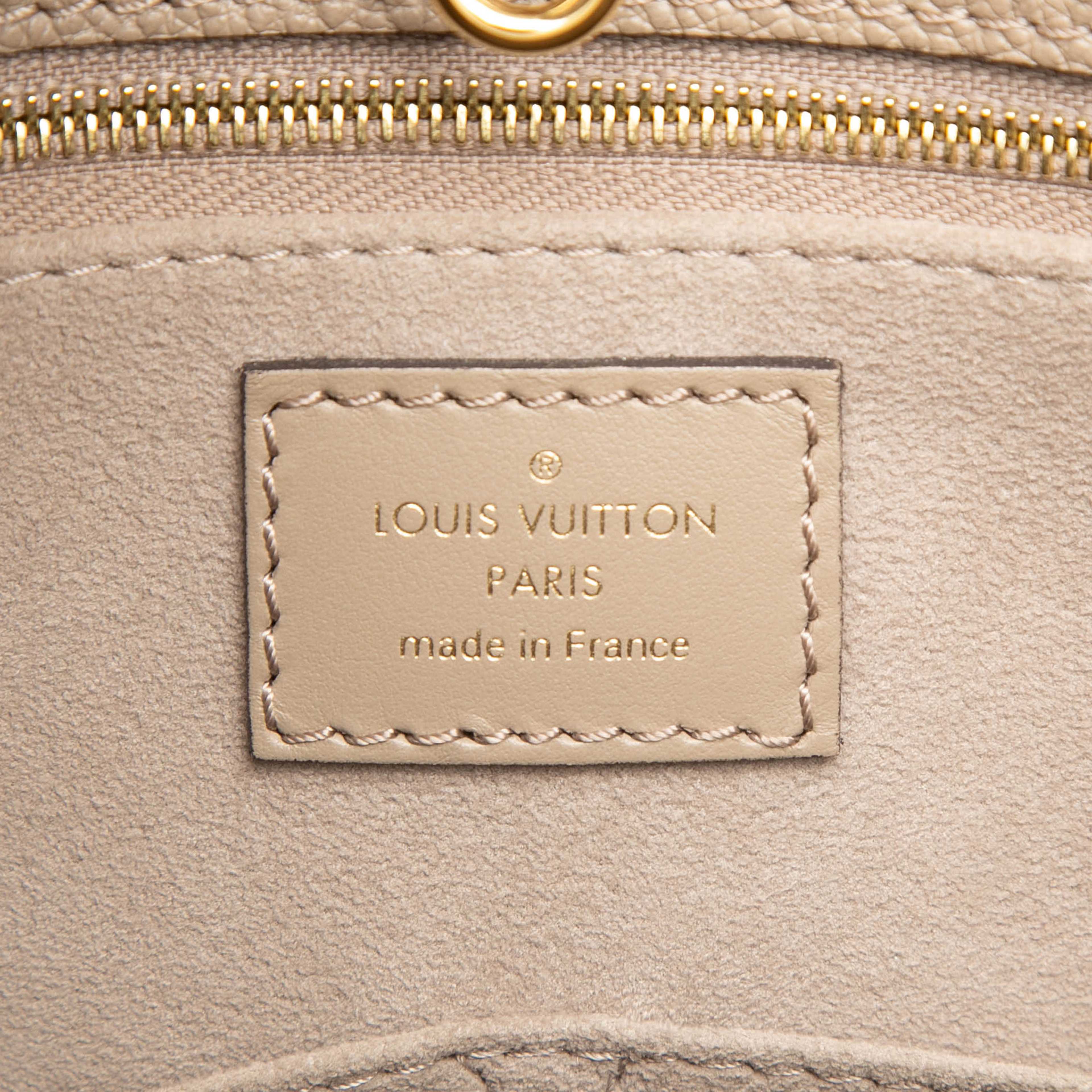 Louis Vuitton Monogram Empreinte Onthego Mm, från Luxclusif, i färgen beige. Klicka för att öppna bilden i stort format
