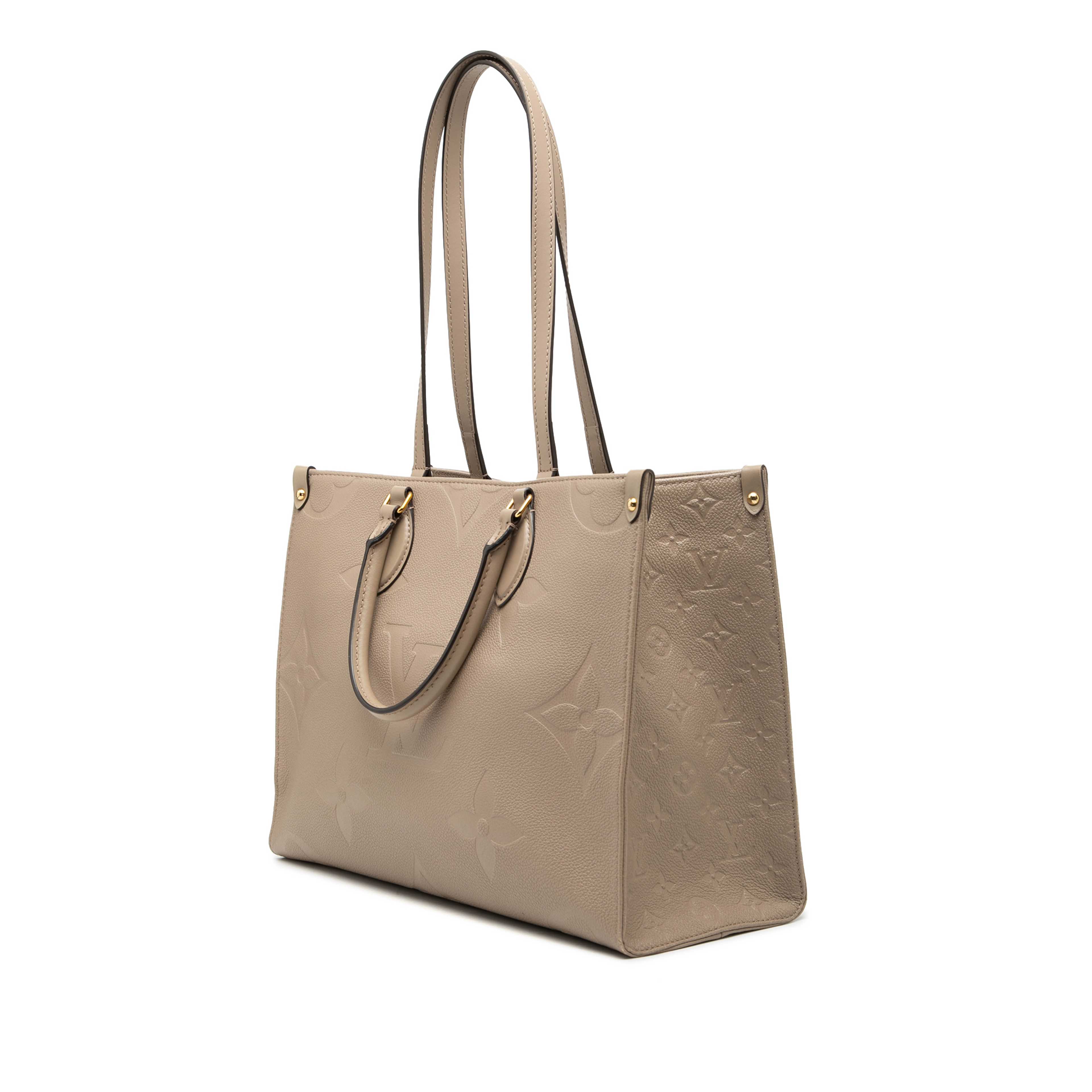 Louis Vuitton Monogram Empreinte Onthego Mm, från Luxclusif, i färgen beige. Klicka för att öppna bilden i stort format