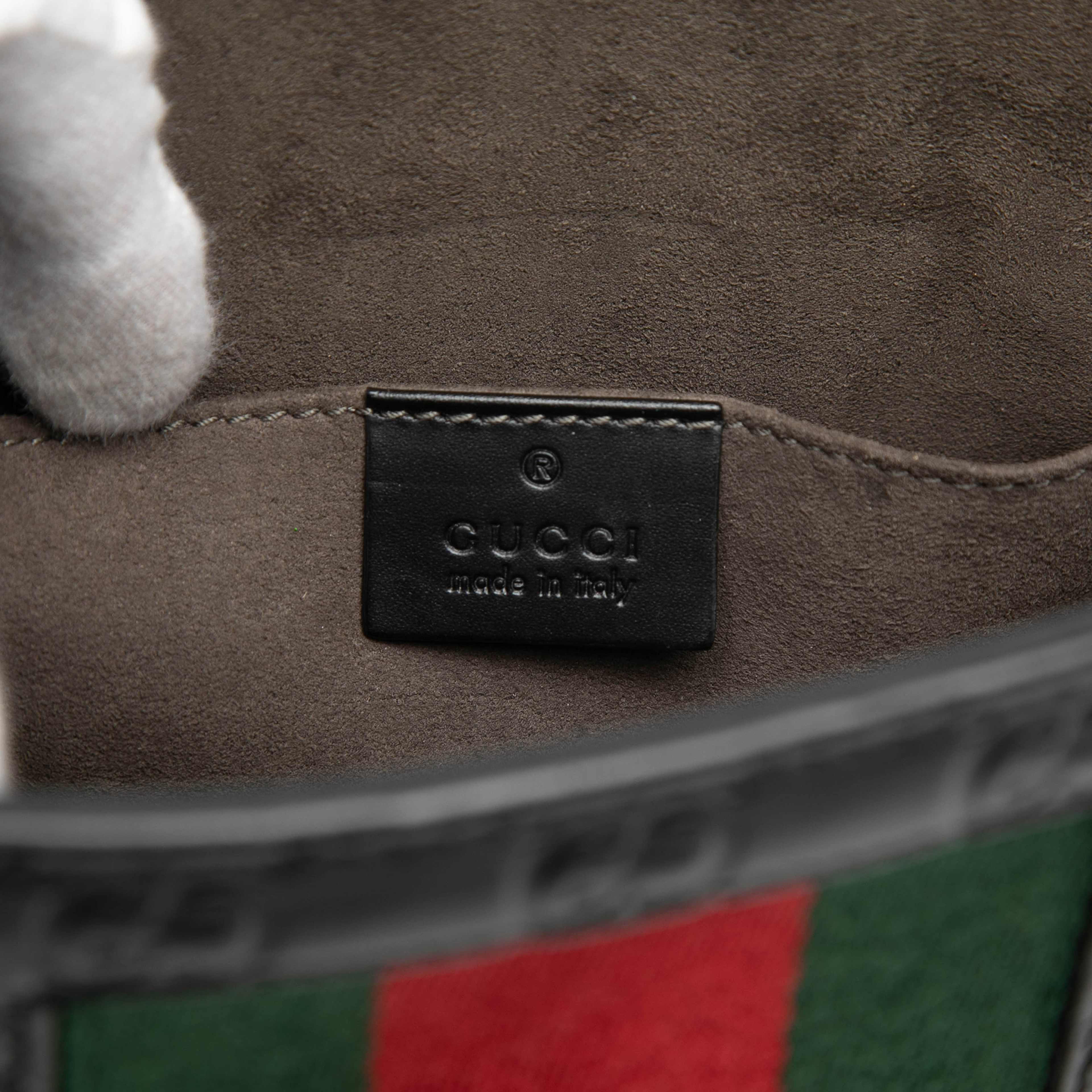 Gucci Guccissima Web Clutch, från Luxclusif, i färgen black. Klicka för att öppna bilden i stort format