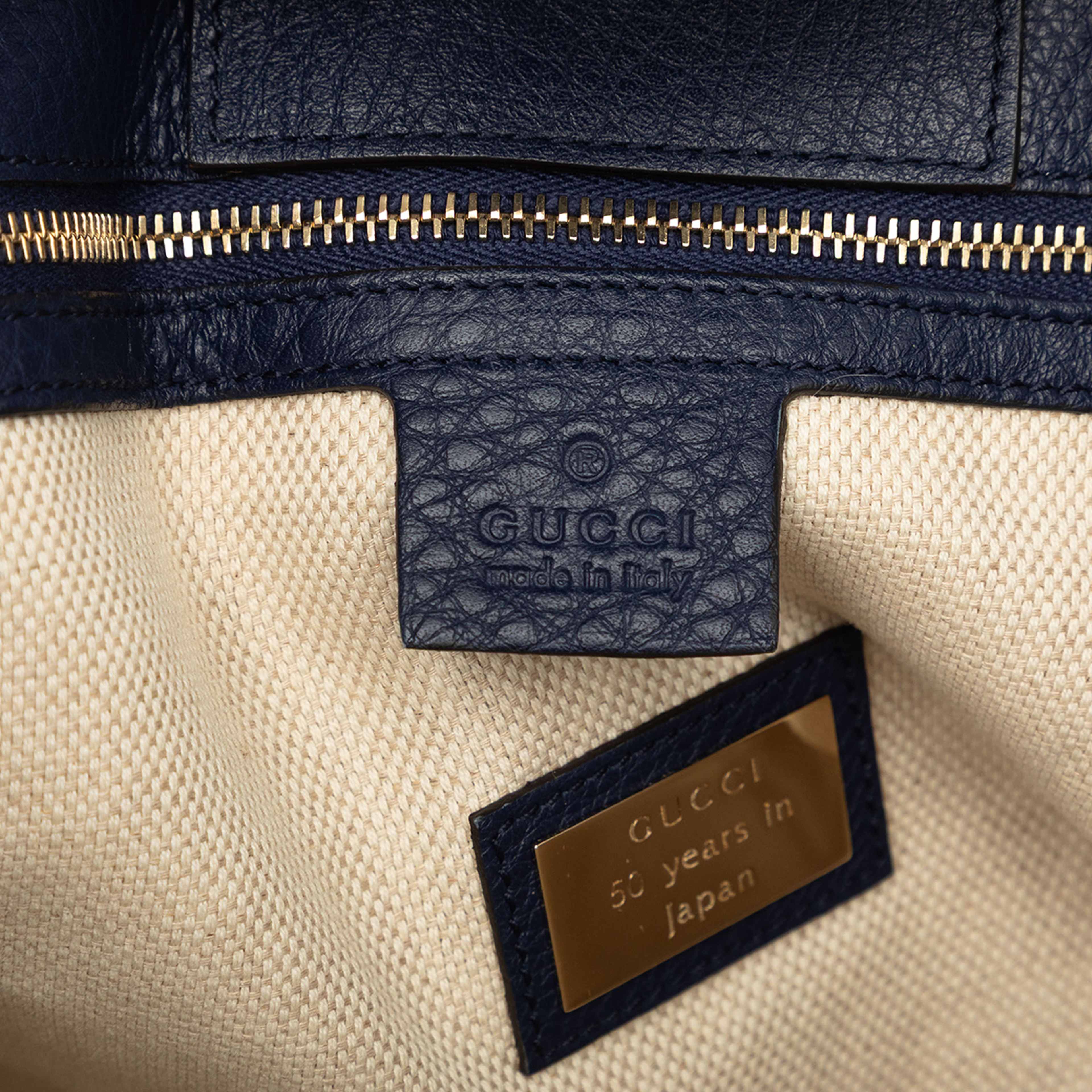 Gucci Medium Canvas Flora Tote, från Luxclusif, i färgen vit. Klicka för att öppna bilden i stort format